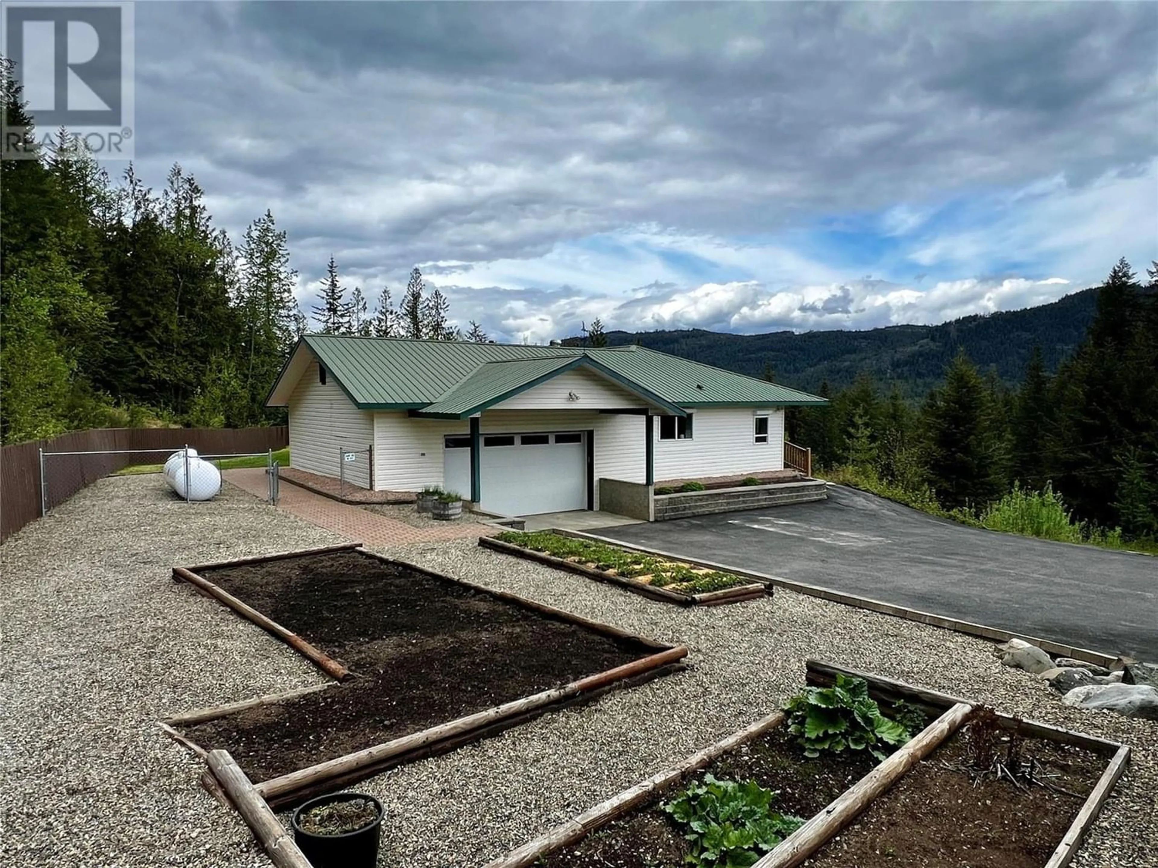 Frontside or backside of a home for 3834 Settle Road, Tappen British Columbia V0E2W0