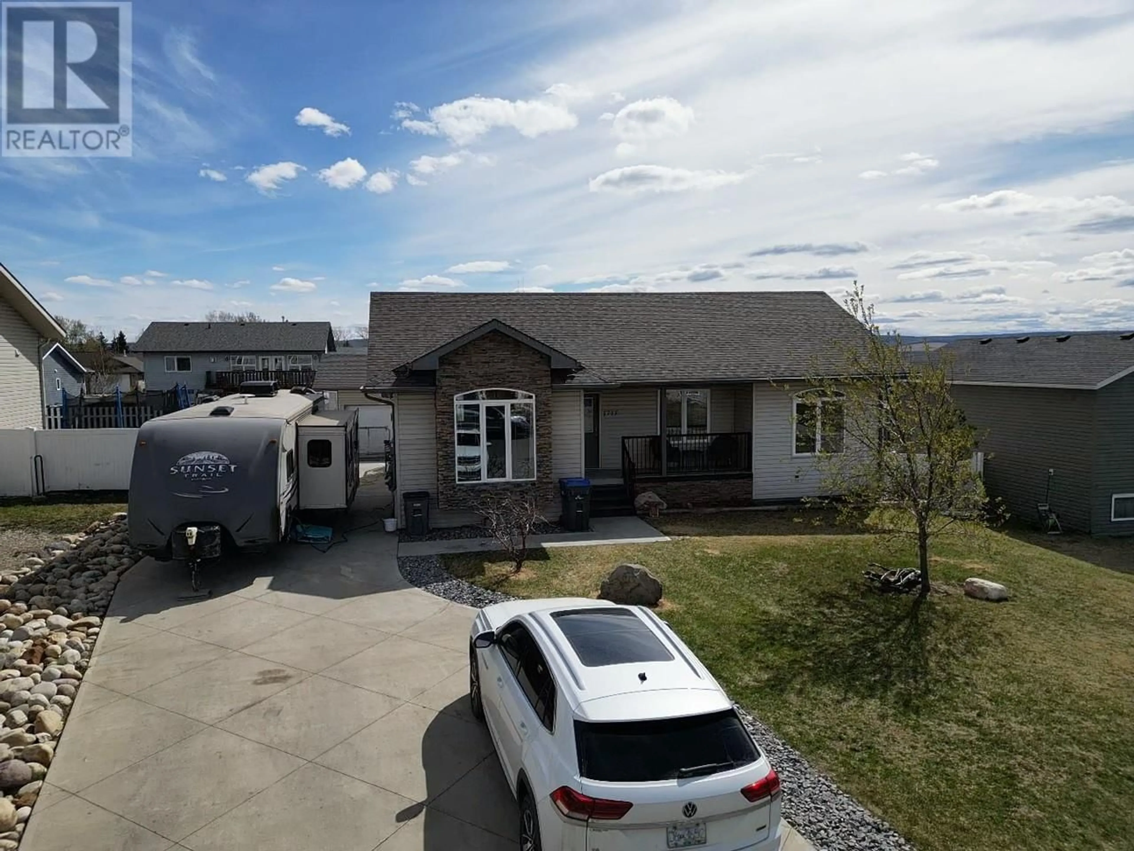 Frontside or backside of a home for 1717 87 Avenue, Dawson Creek British Columbia V1G0B2