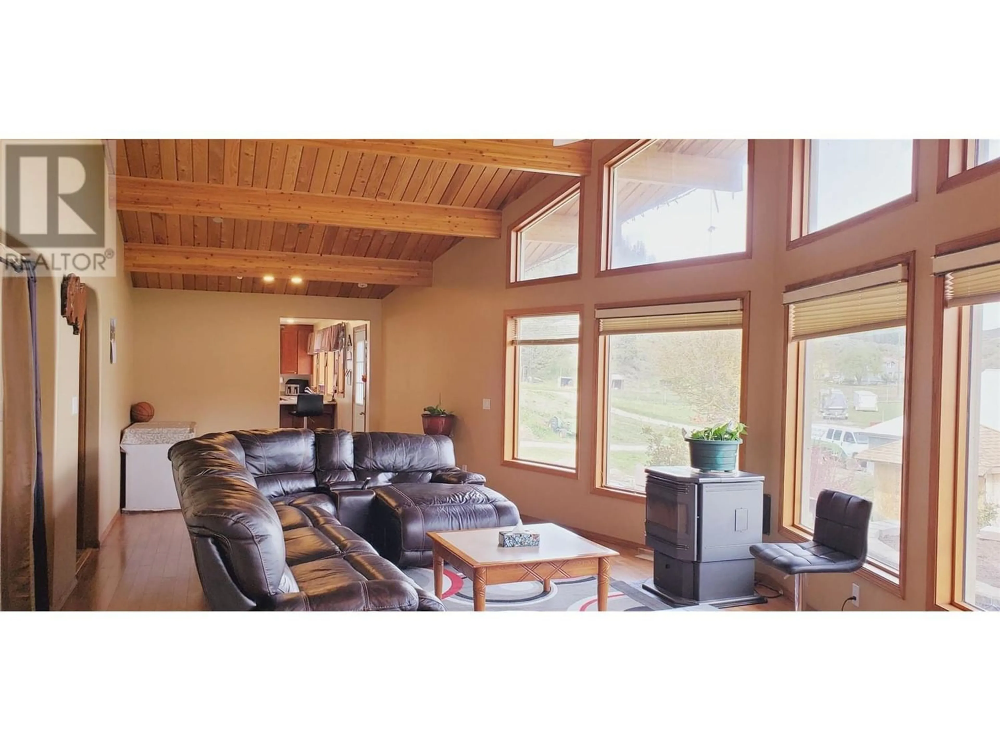 Living room with furniture, wood/laminate floor for 13969 OLD RICHTER PASS Road, Osoyoos British Columbia V0H1V5