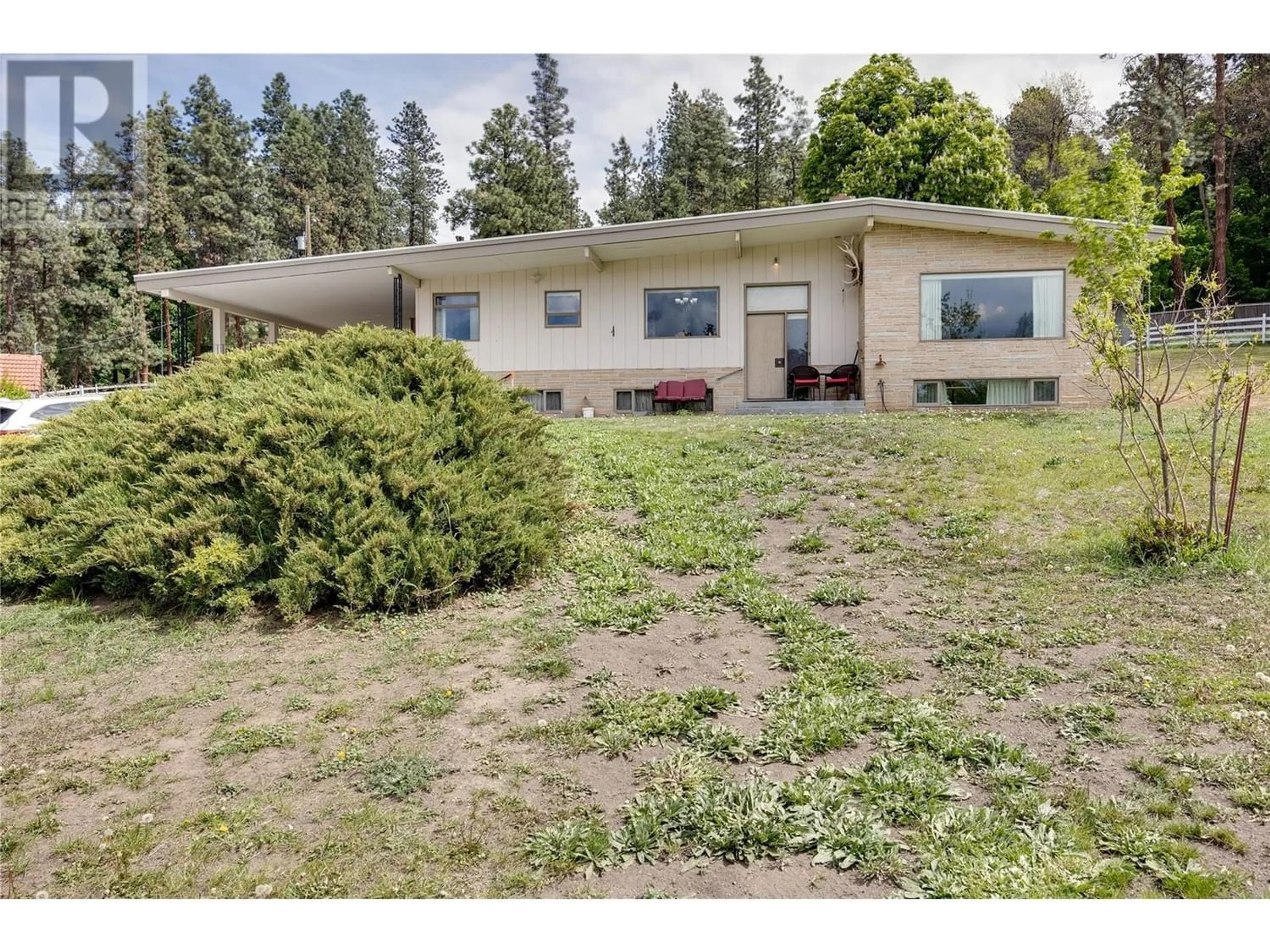 Frontside or backside of a home for 3079 Hall Road, Kelowna British Columbia V1W2R5