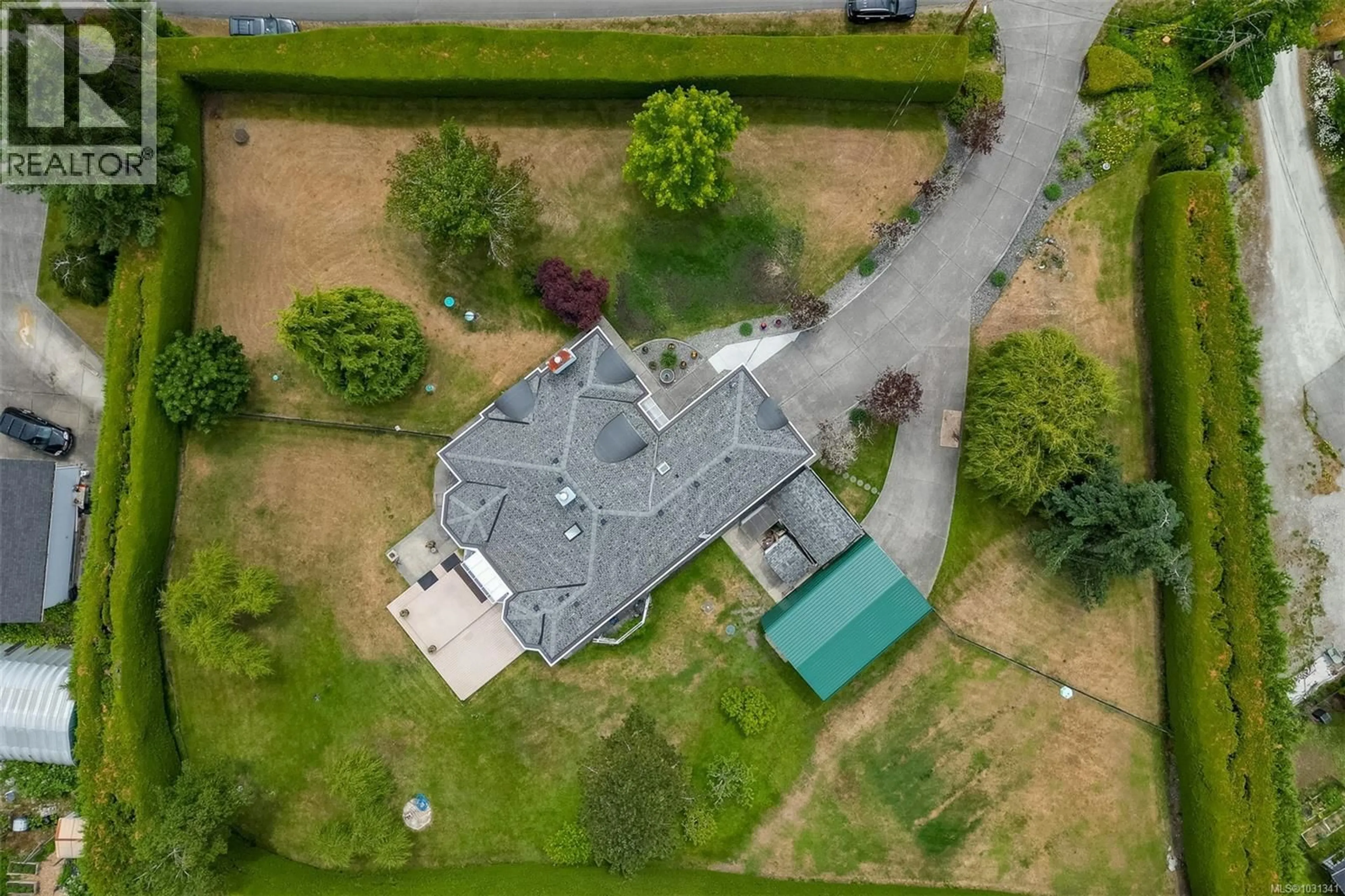A pic from outside/outdoor area/front of a property/back of a property/a pic from drone, building for 10978 CEDAR LANE, North Saanich British Columbia V8L5R1