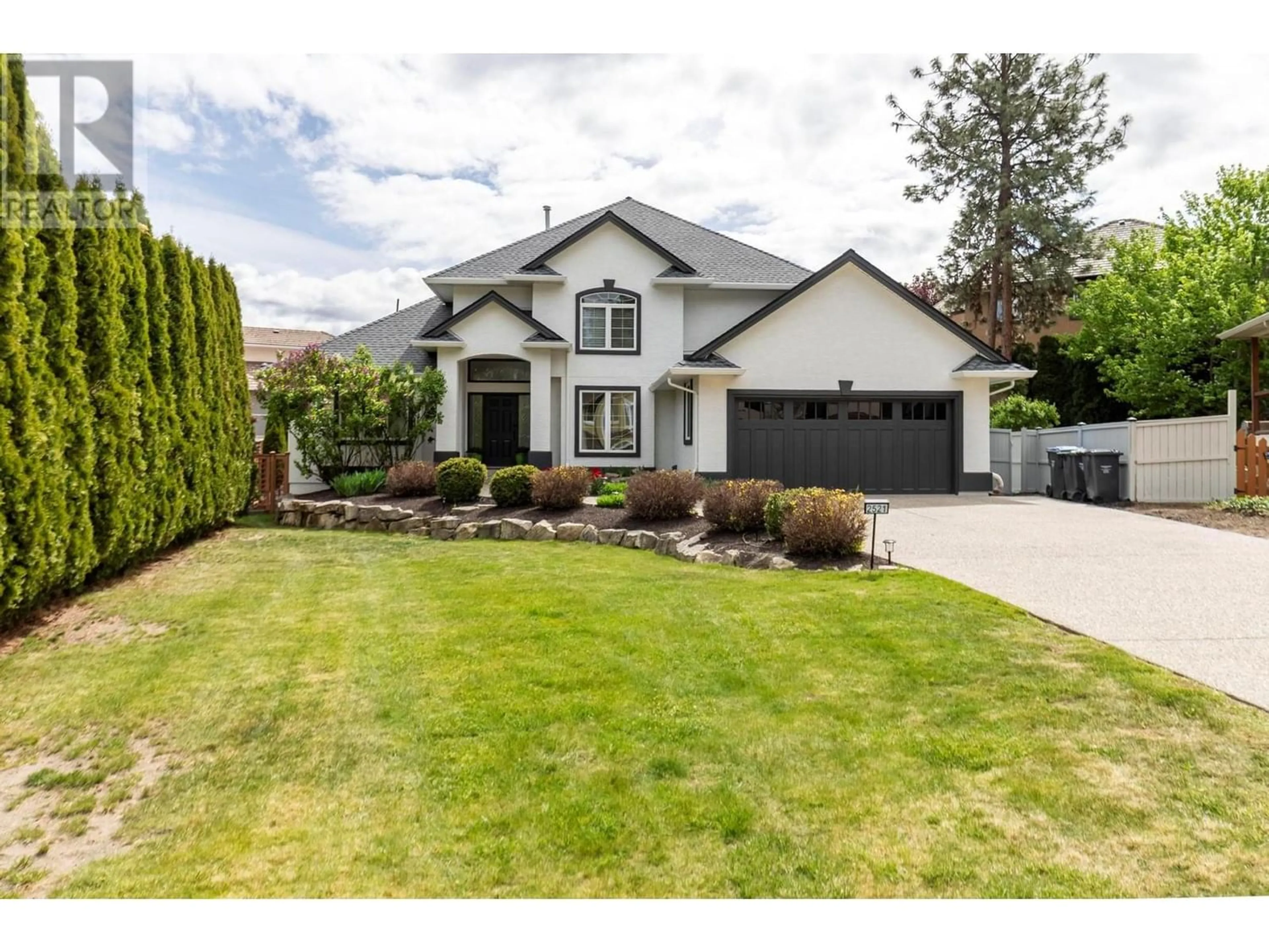 Frontside or backside of a home for 2521 Quail Place, Kelowna British Columbia V1V1Z8