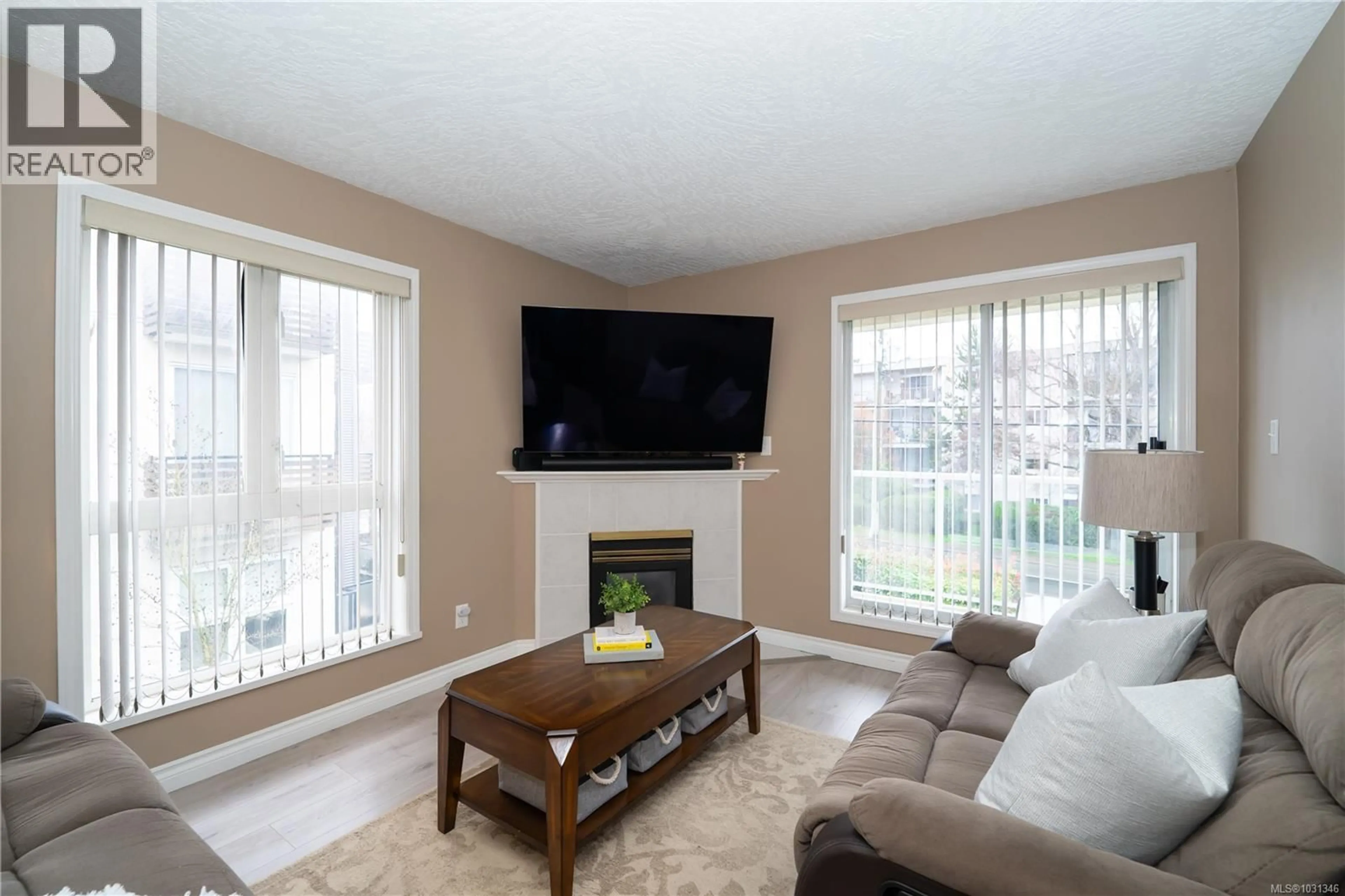 Living room with furniture, unknown for 301 - 331 BURNSIDE ROAD EAST, Victoria British Columbia V9A1A6