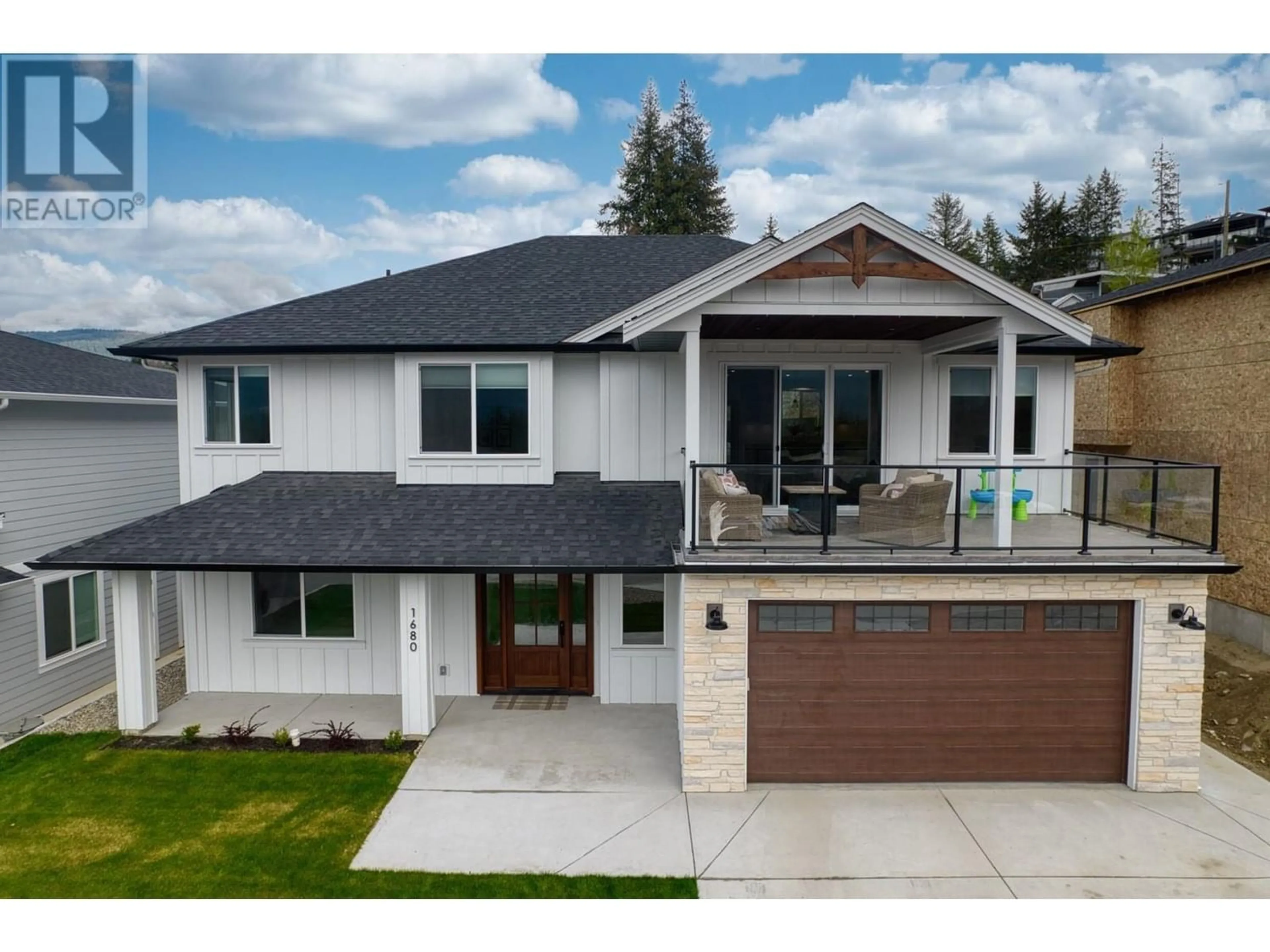 Frontside or backside of a home for 1680 9 Street SE, Salmon Arm British Columbia V1E0B2