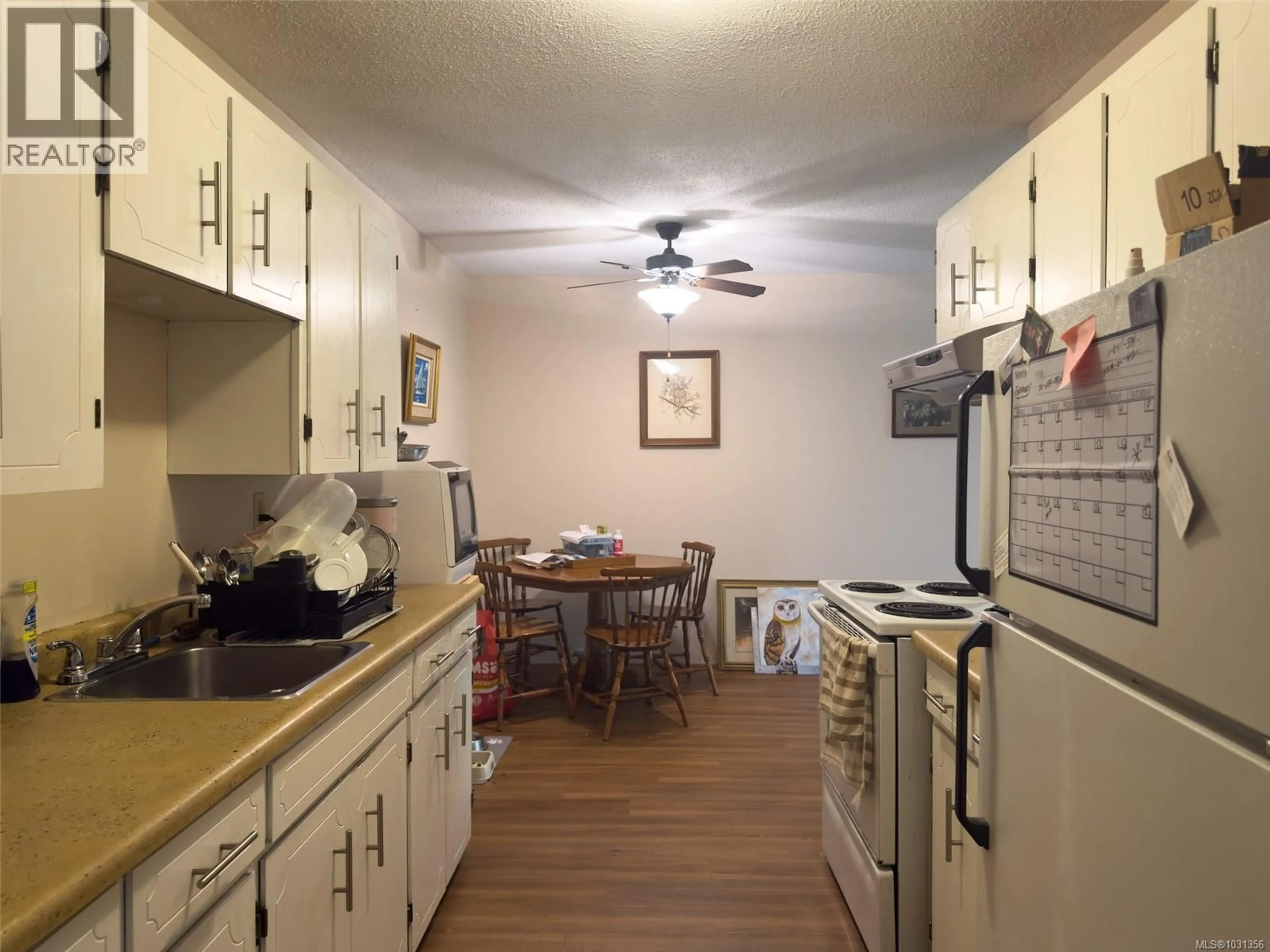 Standard kitchen, wood/laminate floor for 108 - 801 MARINE DRIVE, Port Alice British Columbia V0N2N0