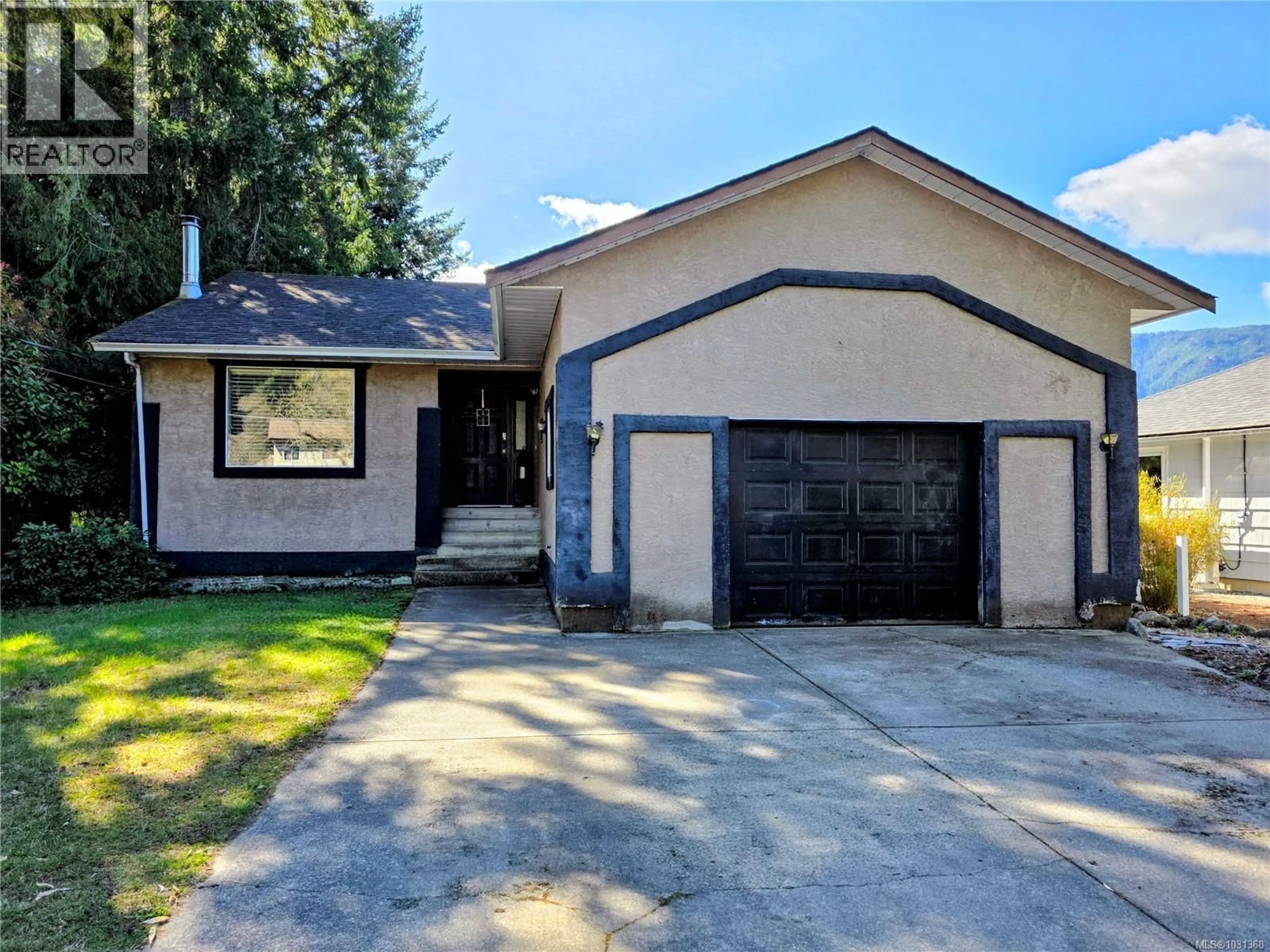 Home with vinyl exterior material, street for 236 GRANTS LAKE ROAD, Lake Cowichan British Columbia V0R2G0