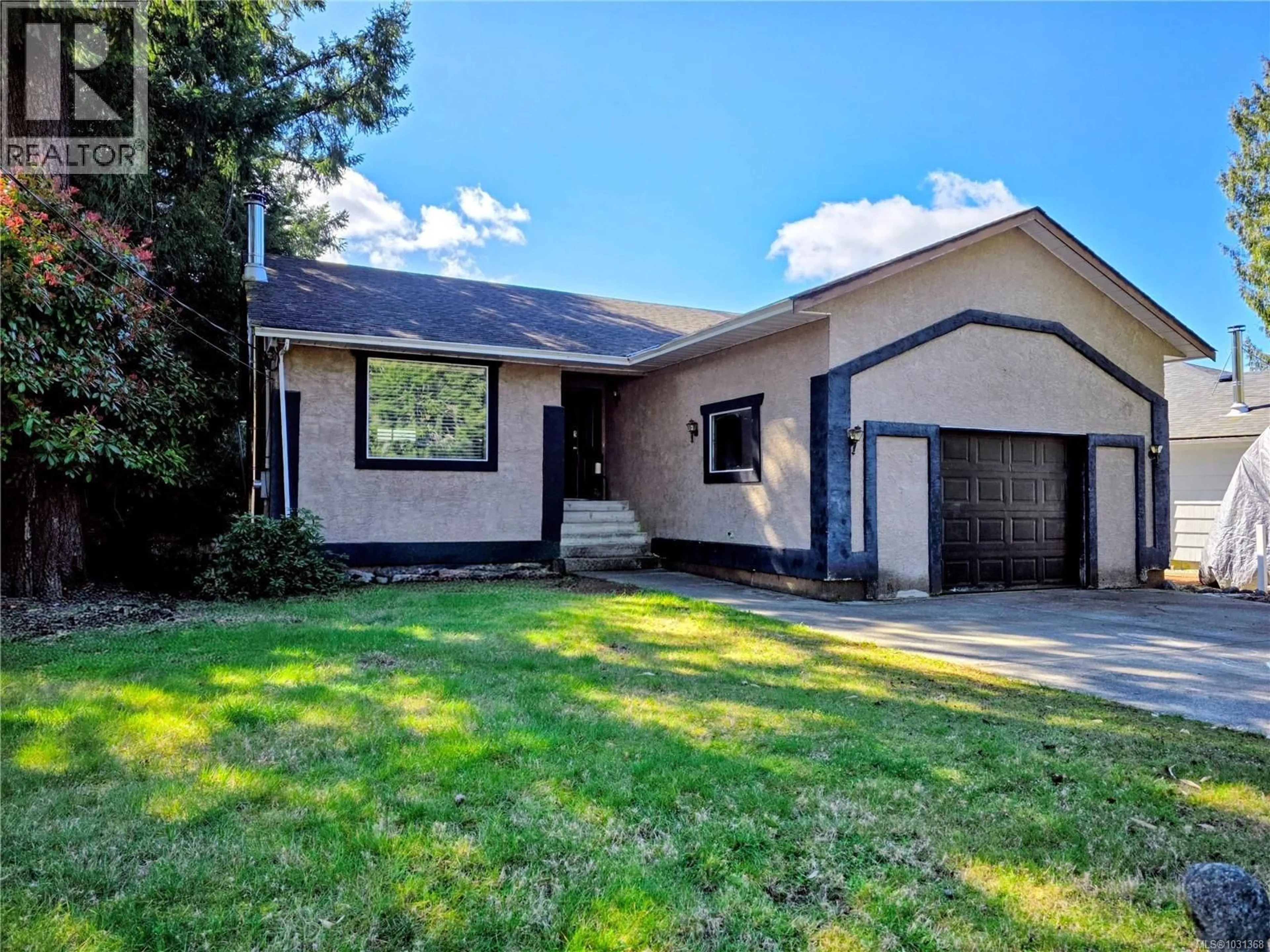 Home with vinyl exterior material, street for 236 GRANTS LAKE ROAD, Lake Cowichan British Columbia V0R2G0