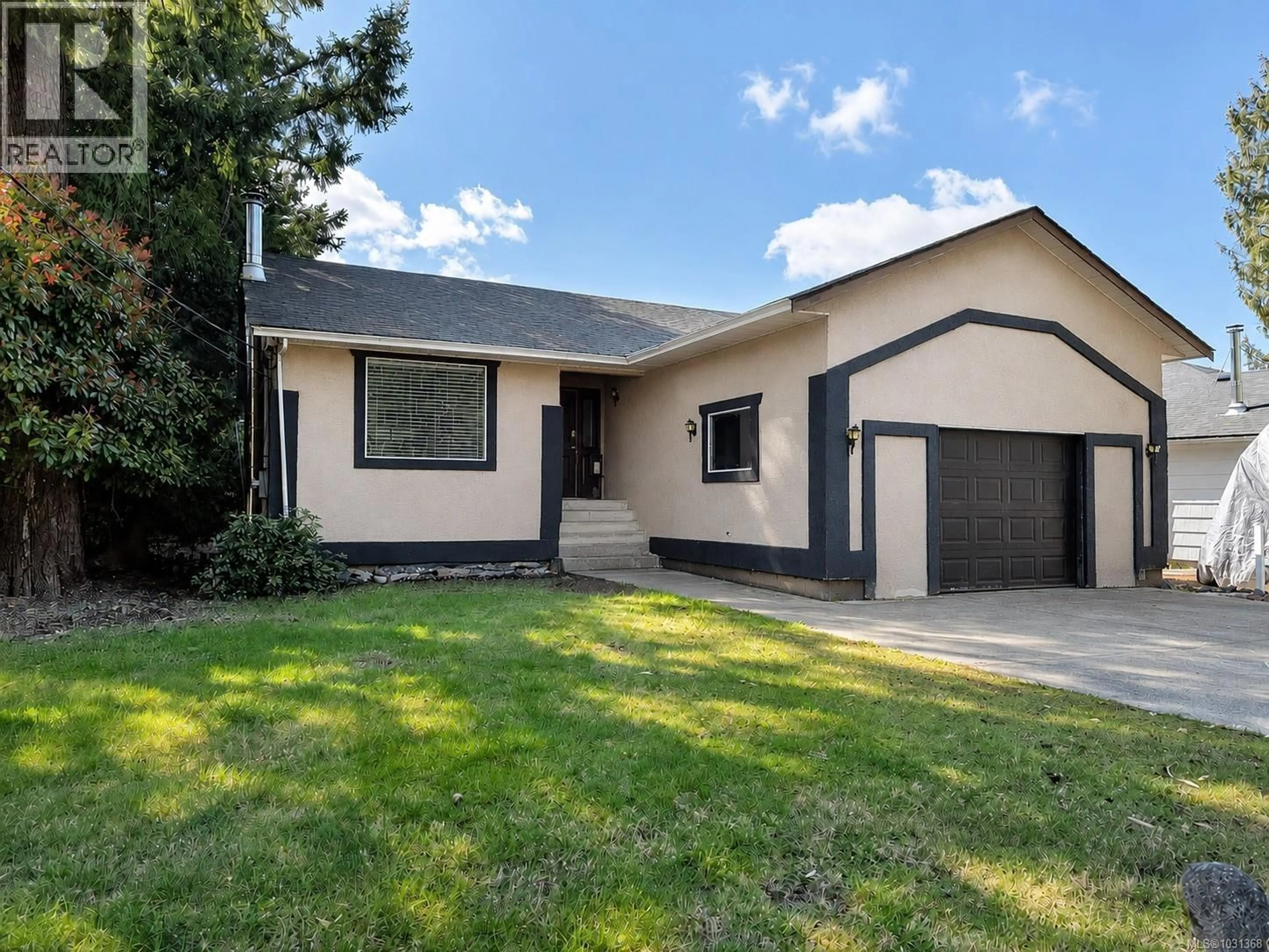 Home with vinyl exterior material, street for 236 GRANTS LAKE ROAD, Lake Cowichan British Columbia V0R2G0