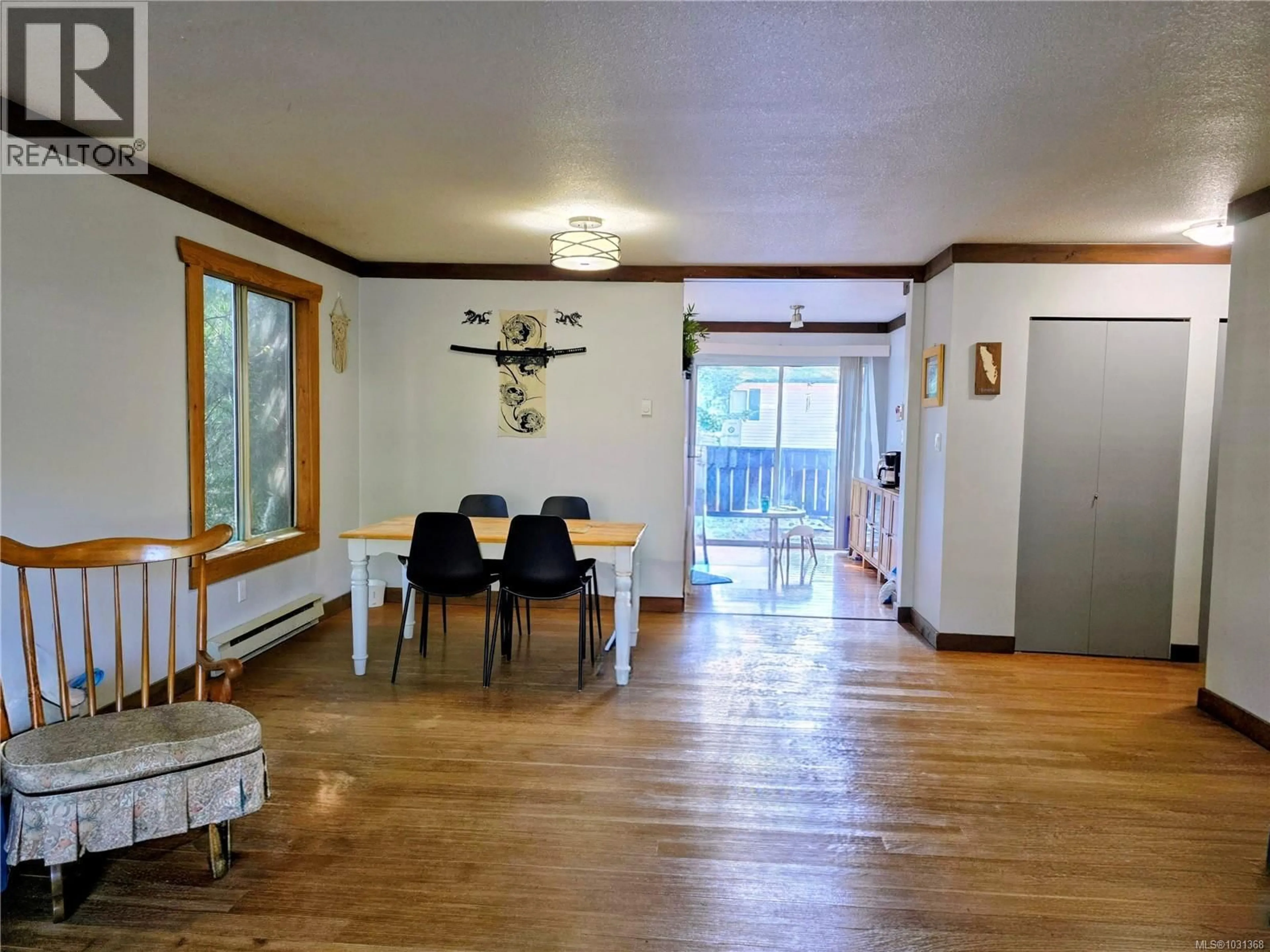 Dining room, wood/laminate floor for 236 GRANTS LAKE ROAD, Lake Cowichan British Columbia V0R2G0