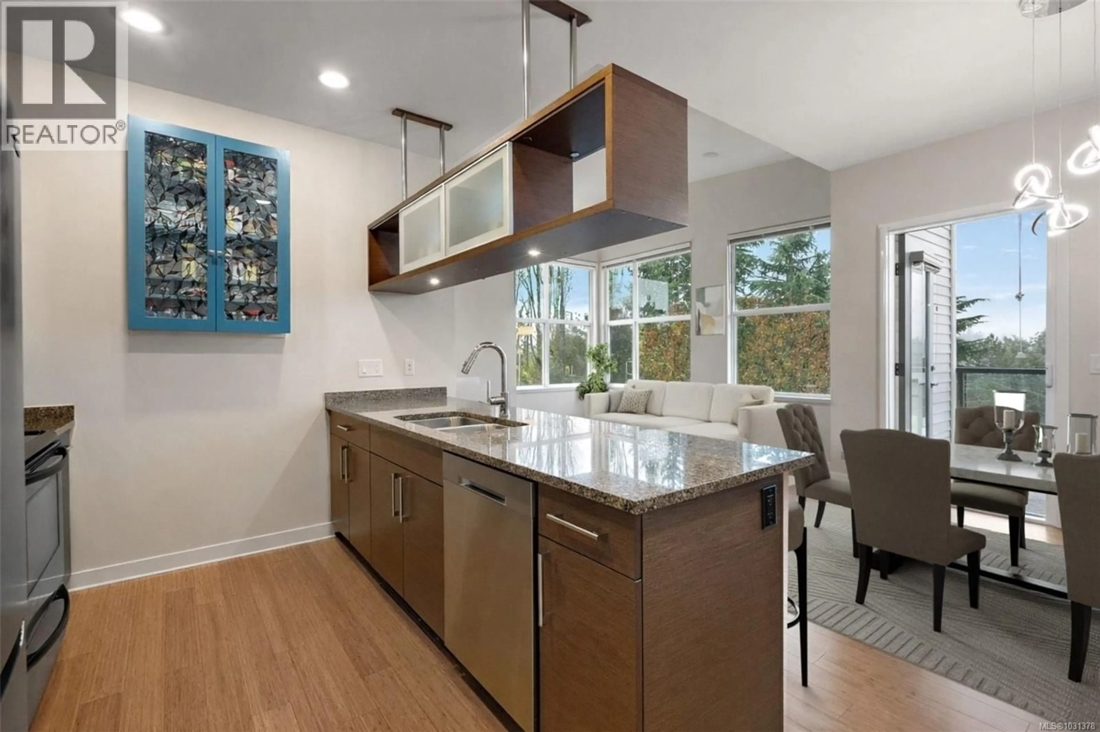 Contemporary kitchen, ceramic/tile floor for 404 - 4394 WEST SAANICH ROAD, Saanich British Columbia V8Z0B5