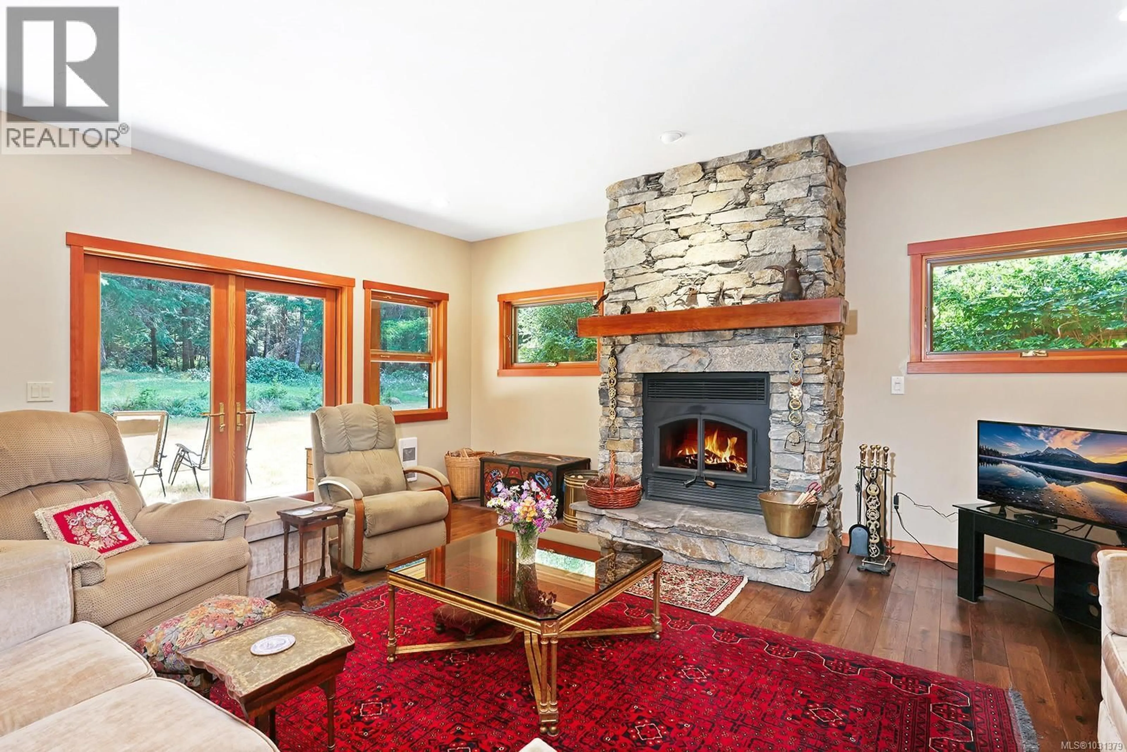 Living room with furniture, unknown for 1645 LEA SMITH ROAD, Hornby Island British Columbia V0R1Z0