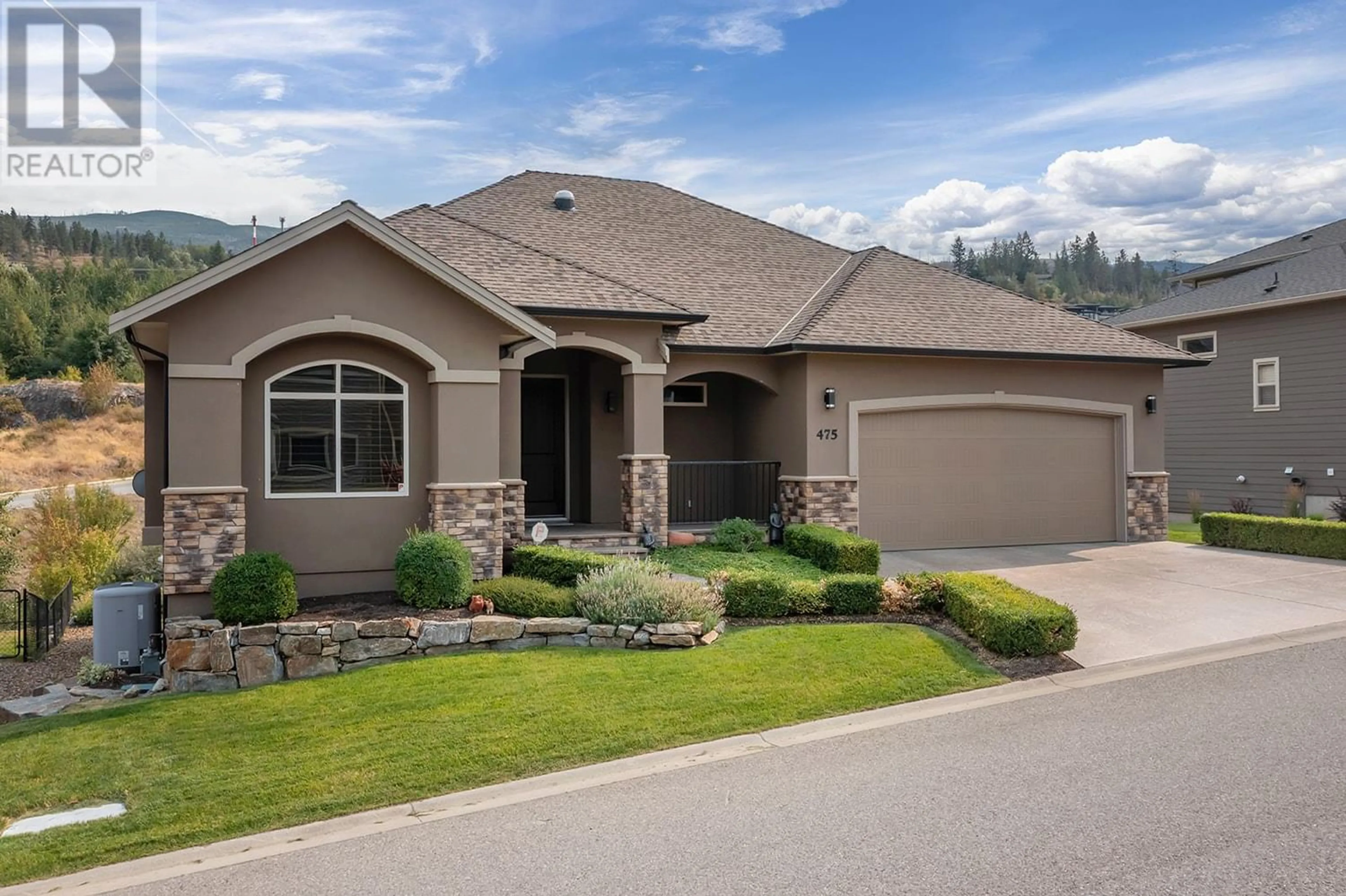 Frontside or backside of a home for 475 Swan Drive, Kelowna British Columbia V1W5J5