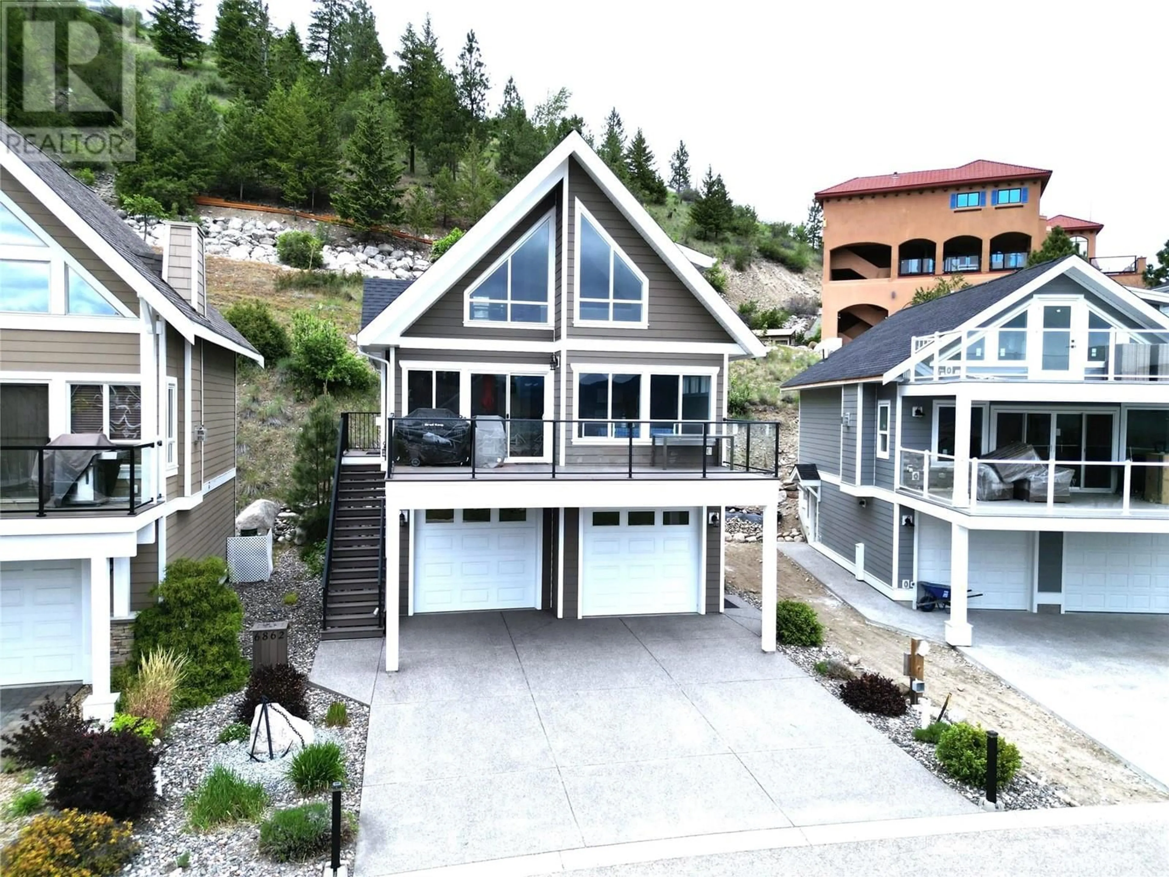 Home with vinyl exterior material, unknown for 6862 MADRID WAY, Kelowna British Columbia V1Z3R8