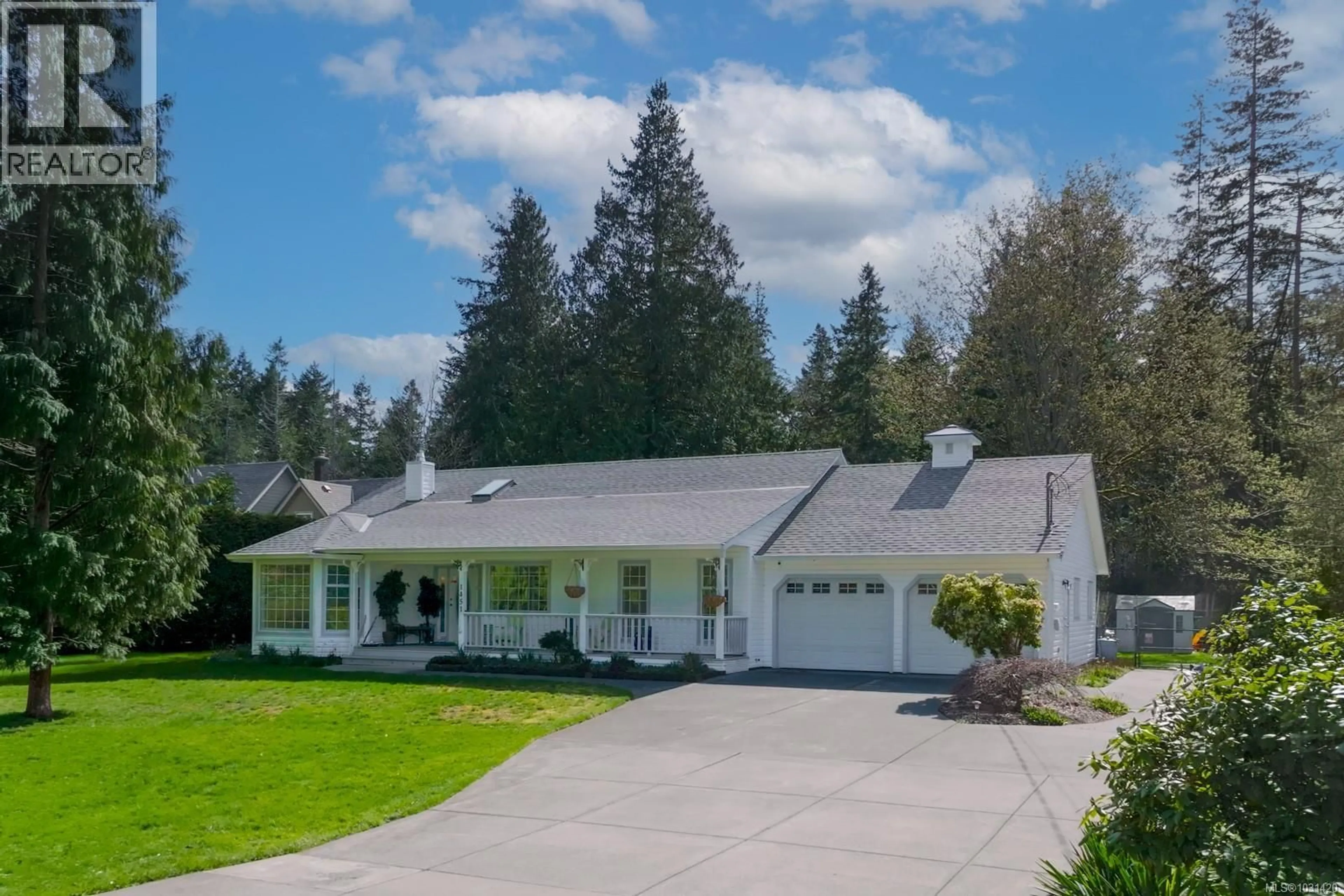 Home with vinyl exterior material, street for 1451 SEAVIEW ROAD, Black Creek British Columbia V9J1J7