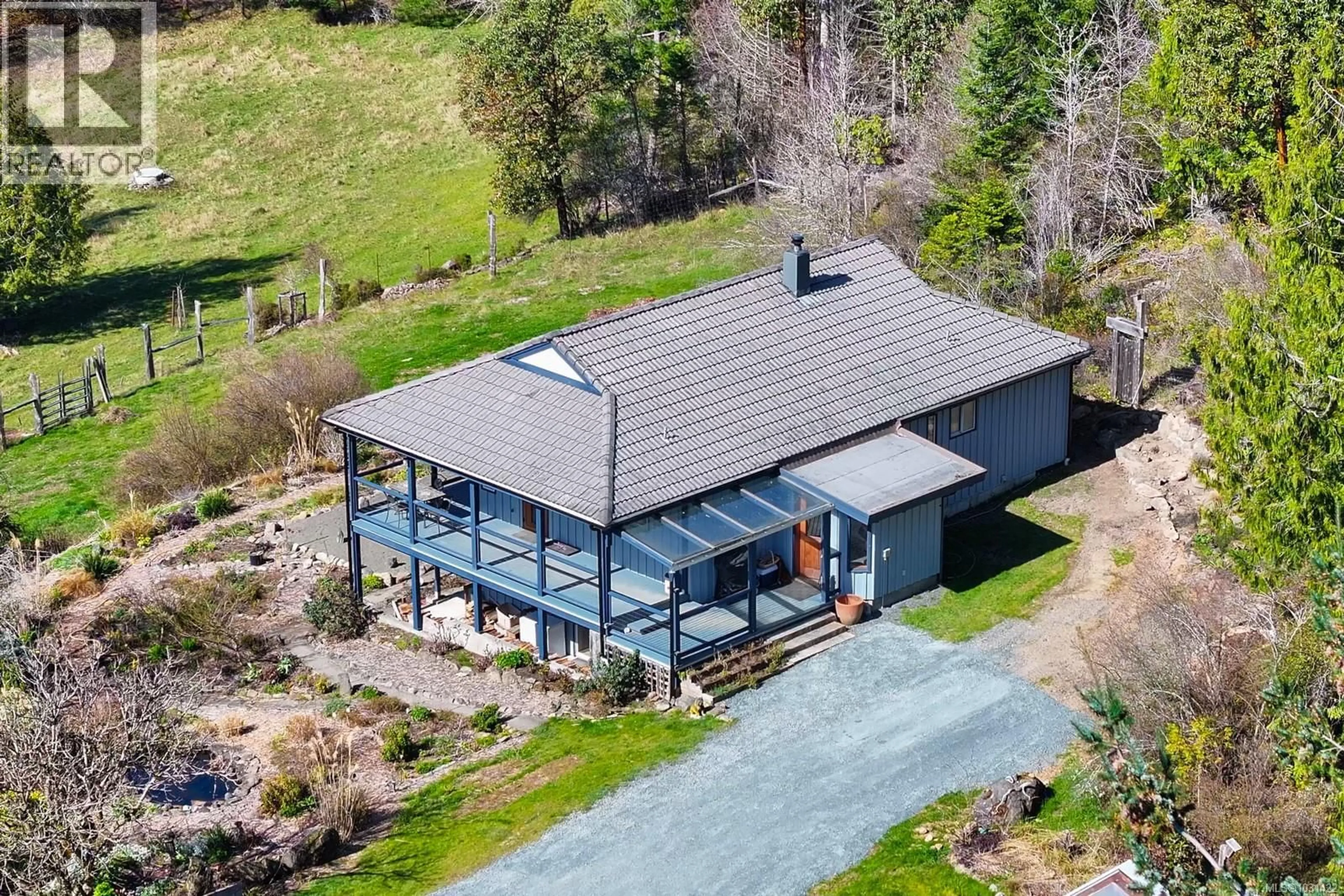A pic from outside/outdoor area/front of a property/back of a property/a pic from drone, building for 3800 LACON ROAD, Denman Island British Columbia V0R1T0
