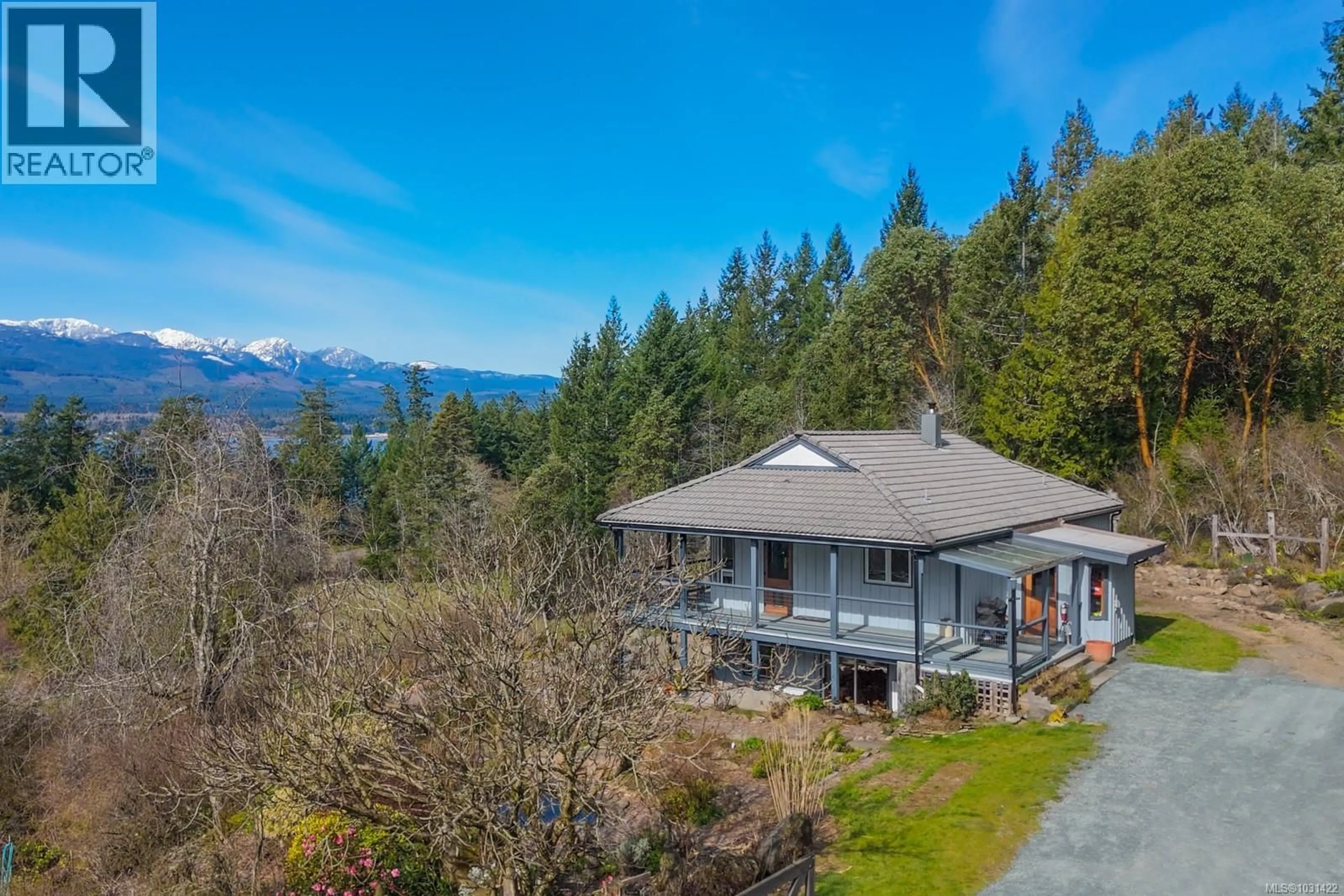 A pic from outside/outdoor area/front of a property/back of a property/a pic from drone, mountain view for 3800 LACON ROAD, Denman Island British Columbia V0R1T0