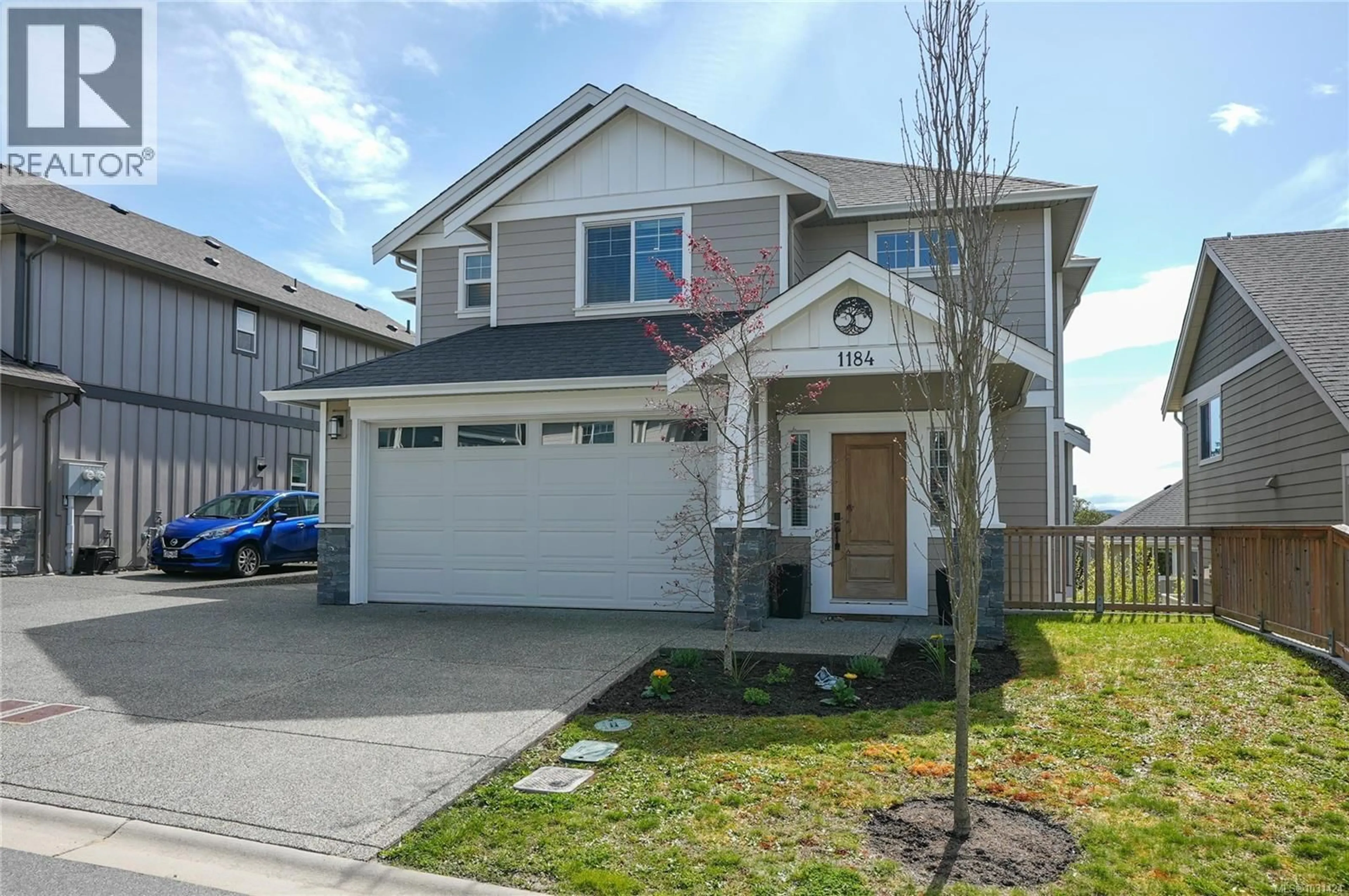 Home with vinyl exterior material, street for 1184 SMOKEHOUSE CRESCENT, Langford British Columbia V9C0N5