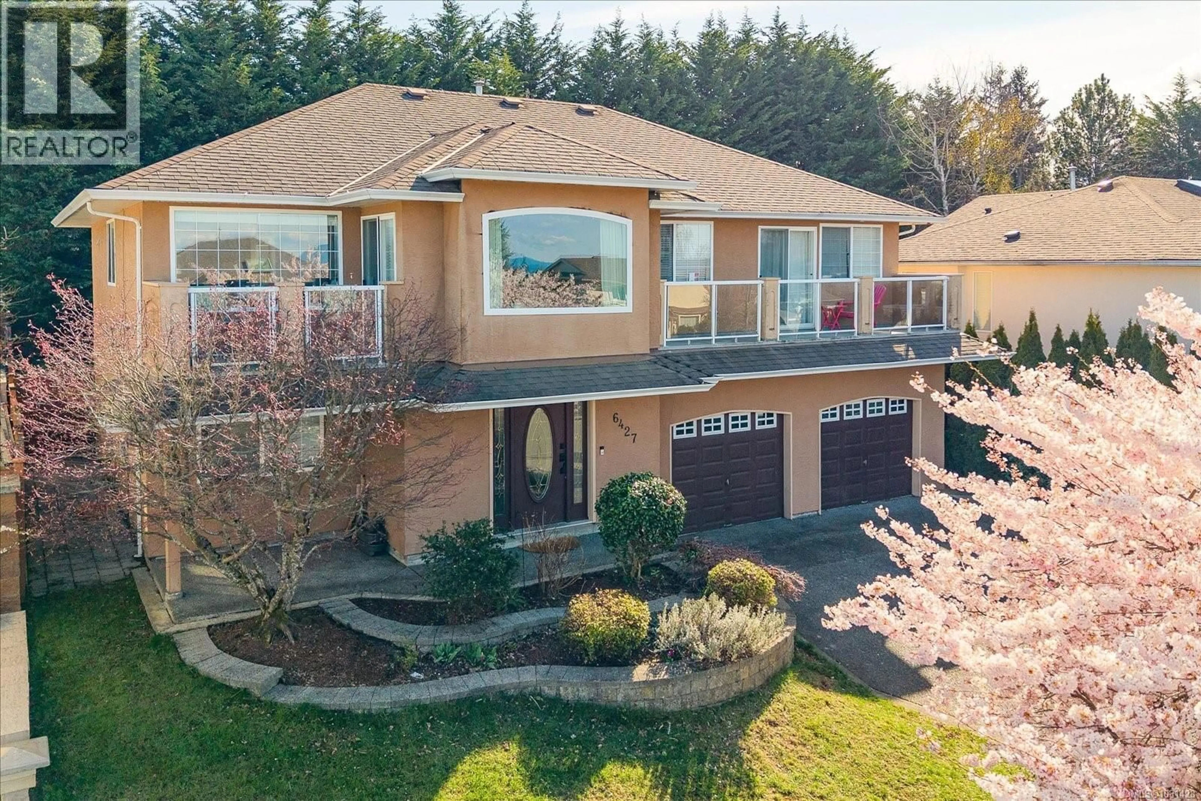 A pic from outside/outdoor area/front of a property/back of a property/a pic from drone, unknown for 6427 NIDRI PLACE, Nanaimo British Columbia V9V1N6