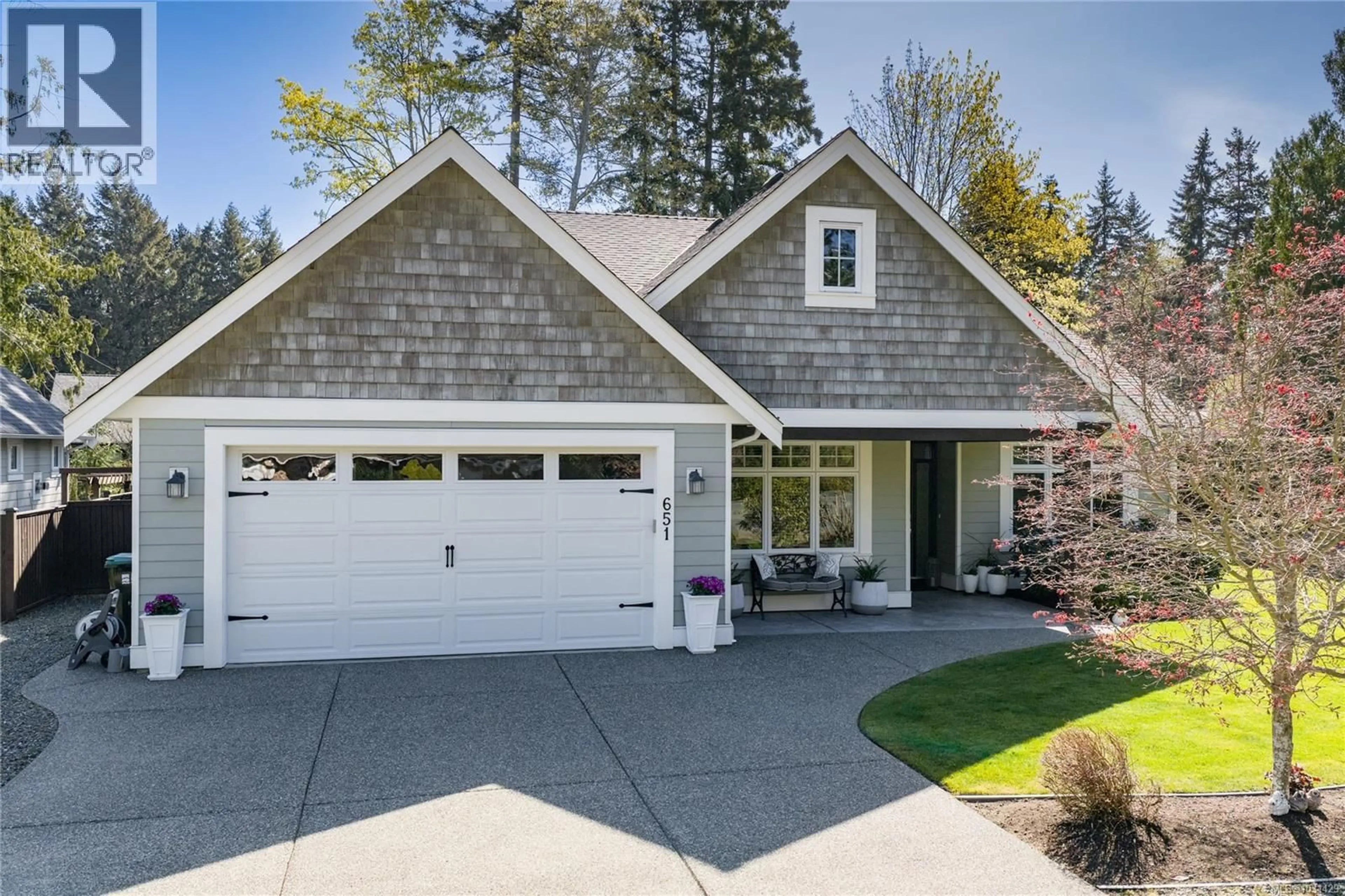 Home with vinyl exterior material, street for 651 EAGLECREST DRIVE, Qualicum Beach British Columbia V9K1E4
