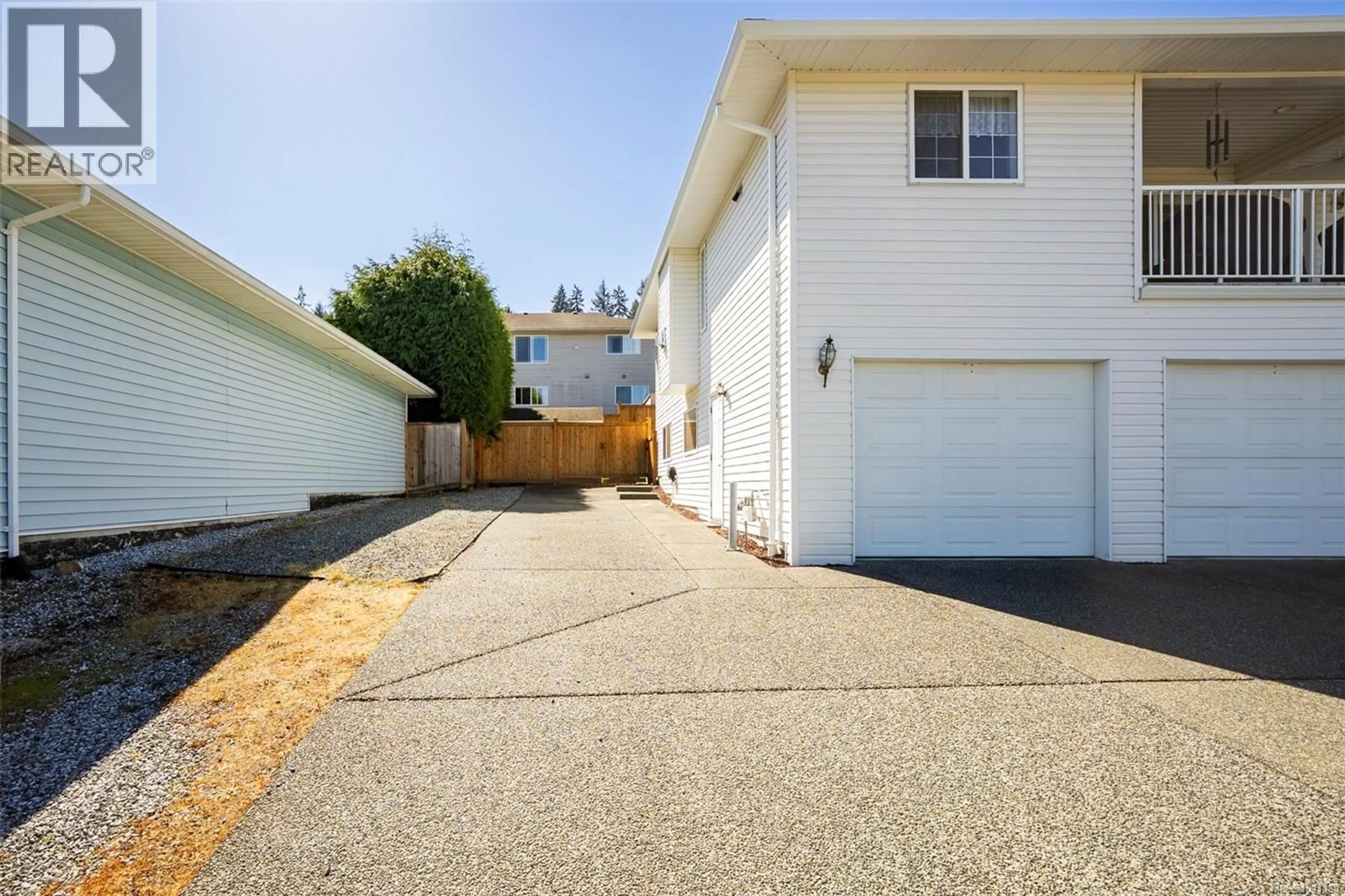 Home with vinyl exterior material, street for 4749 HAMMOND BAY ROAD, Nanaimo British Columbia V9T5A9