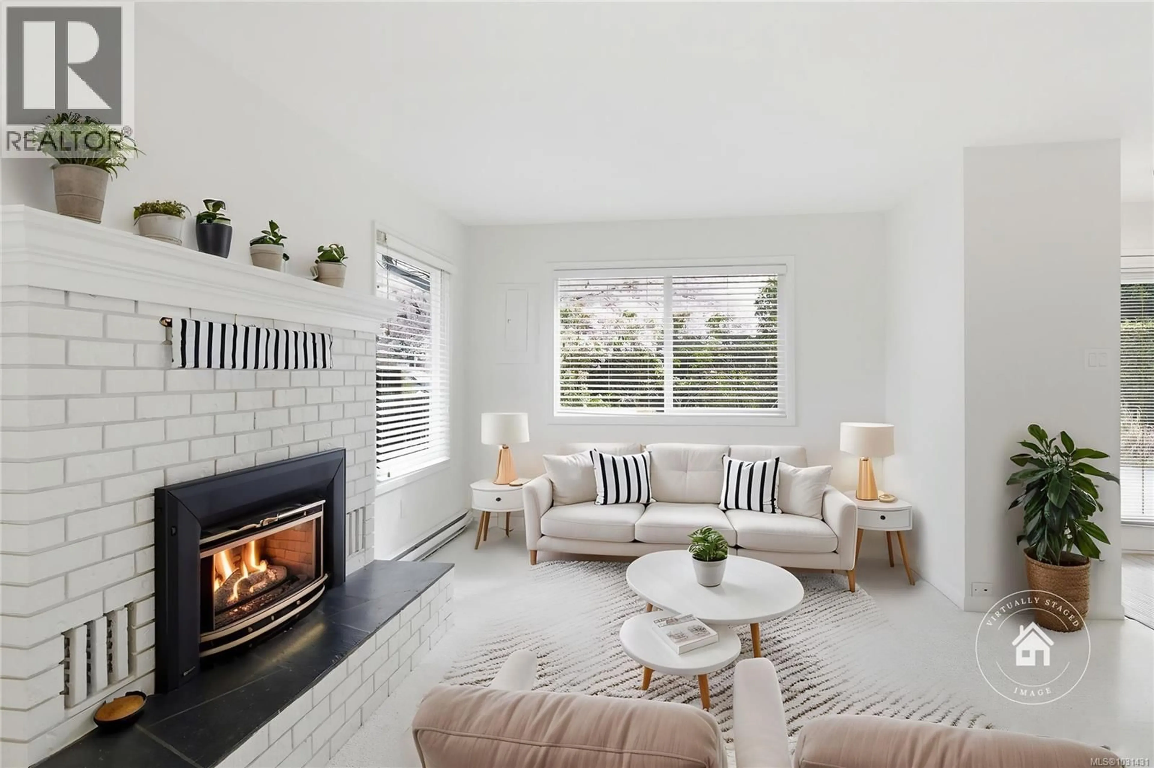 Living room with furniture, ceramic/tile floor for 629 JONES STREET, Qualicum Beach British Columbia V9K1H2