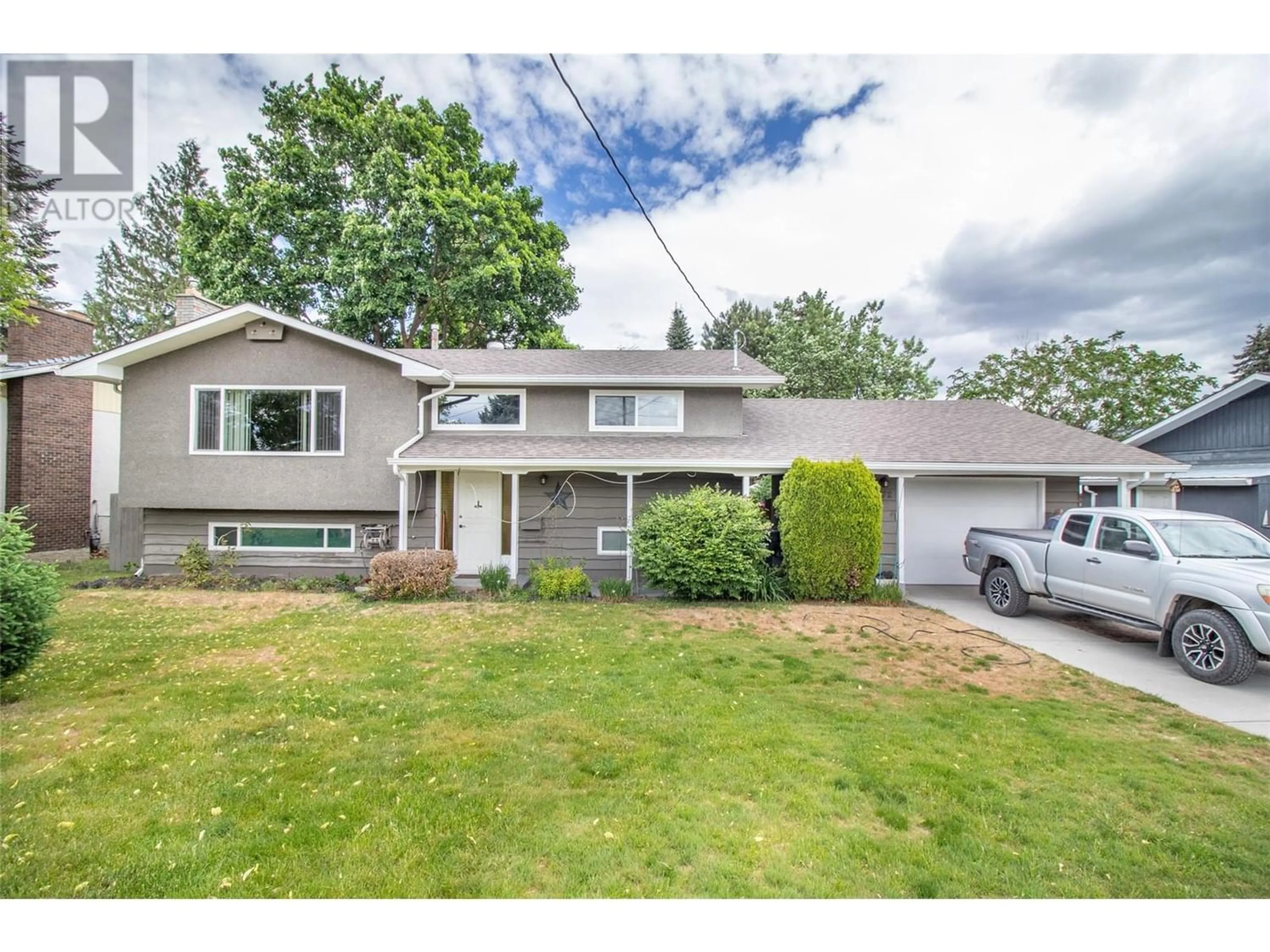 Frontside or backside of a home for 172 Wallace Road, Kelowna British Columbia V1X4T1