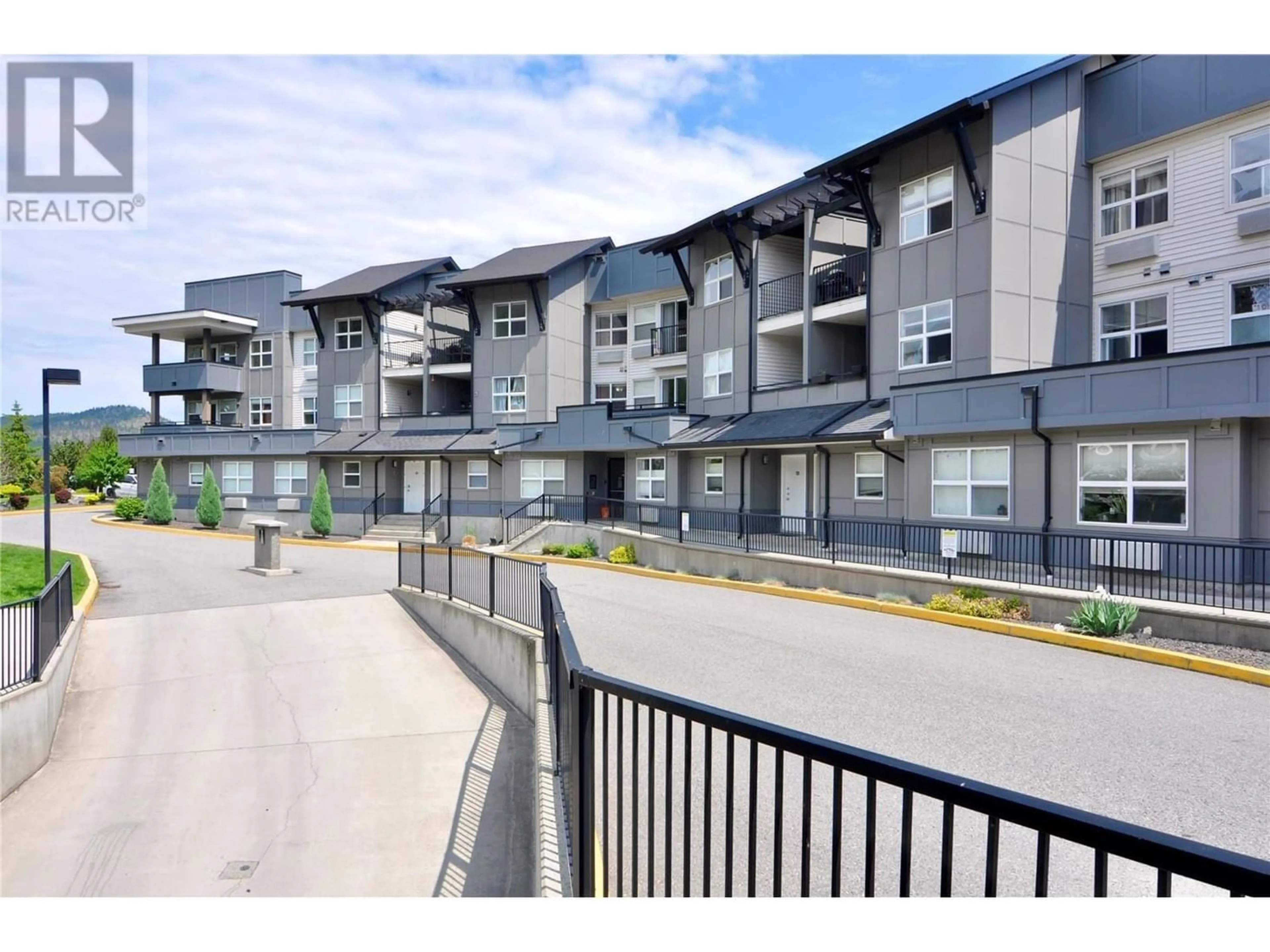 A pic from exterior of the house or condo for 1479 Glenmore Road N Unit# 311, Kelowna British Columbia V1V2C5
