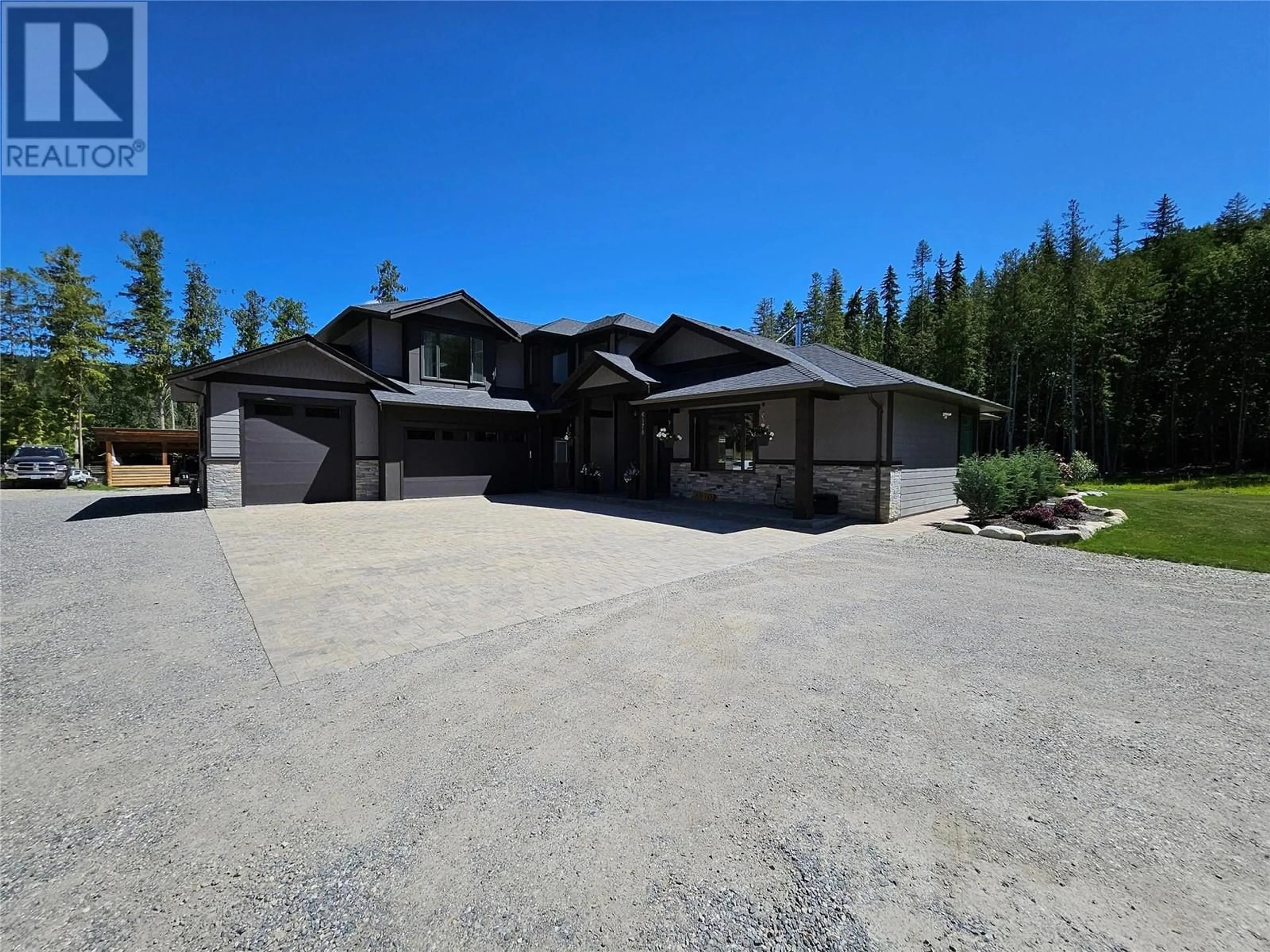 Frontside or backside of a home for 6970 Tillicum Road, Vernon British Columbia V1B3N9
