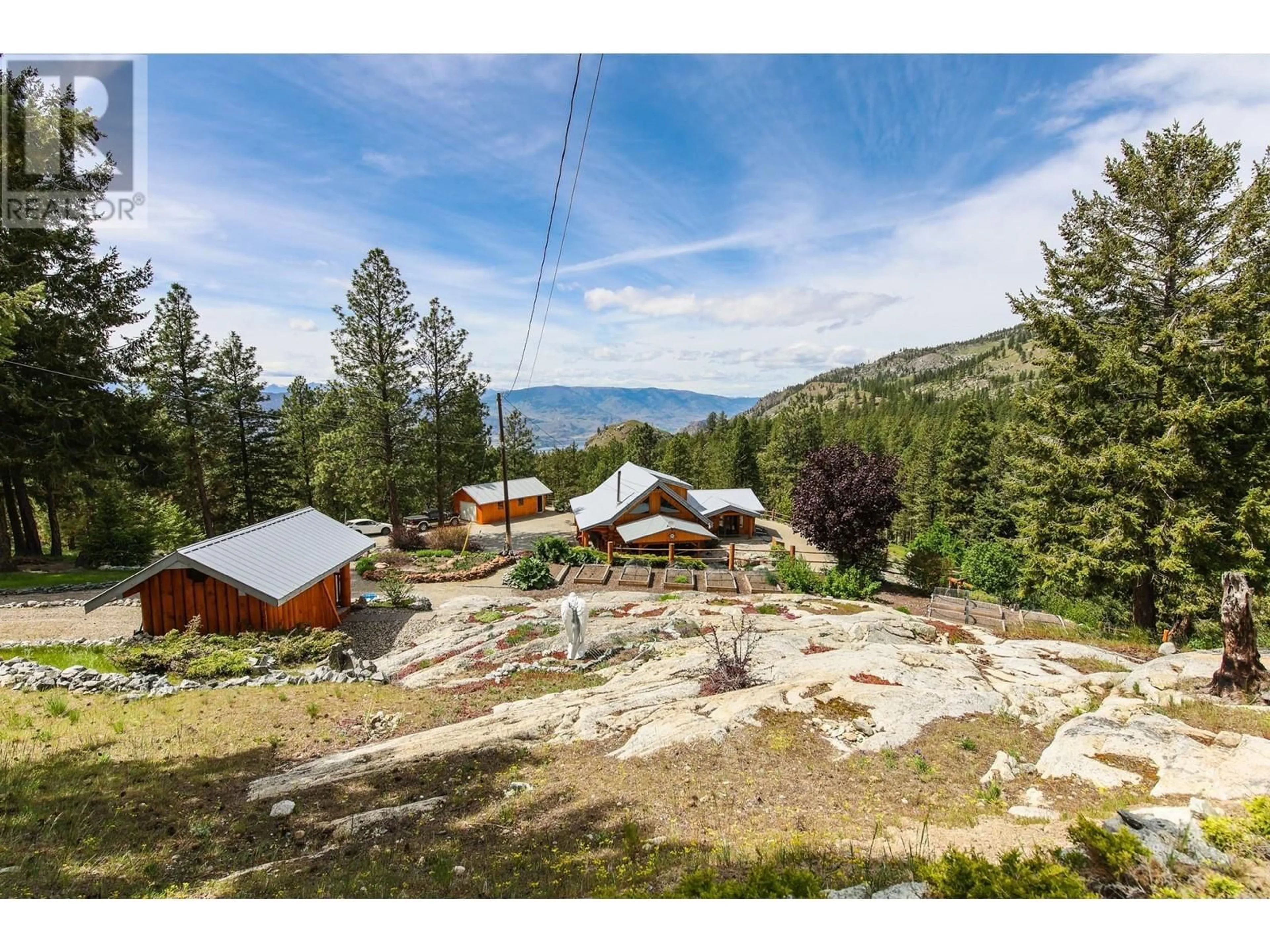 A pic from outside/outdoor area/front of a property/back of a property/a pic from drone, mountain view for 118 MAGUIRE ROAD, Osoyoos British Columbia V0H1V6