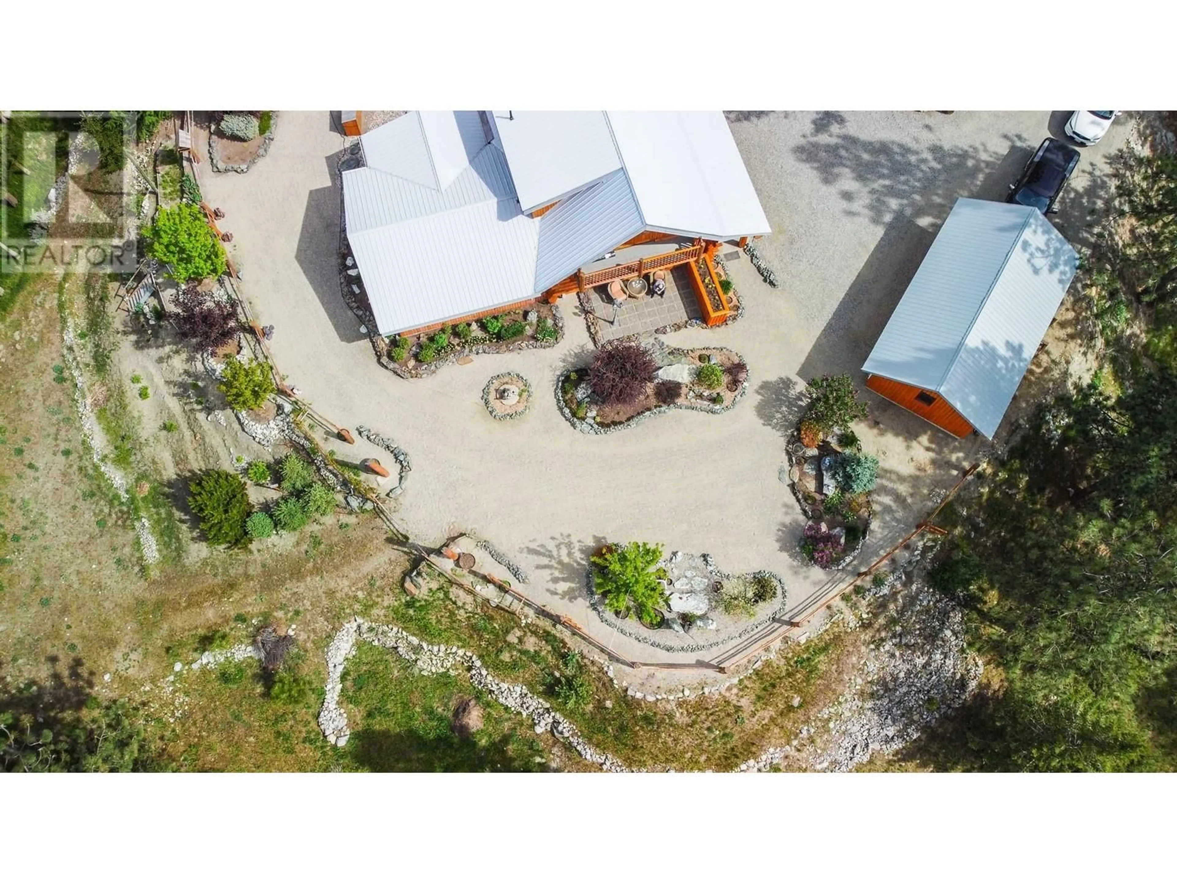 A pic from outside/outdoor area/front of a property/back of a property/a pic from drone, unknown for 118 MAGUIRE ROAD, Osoyoos British Columbia V0H1V6