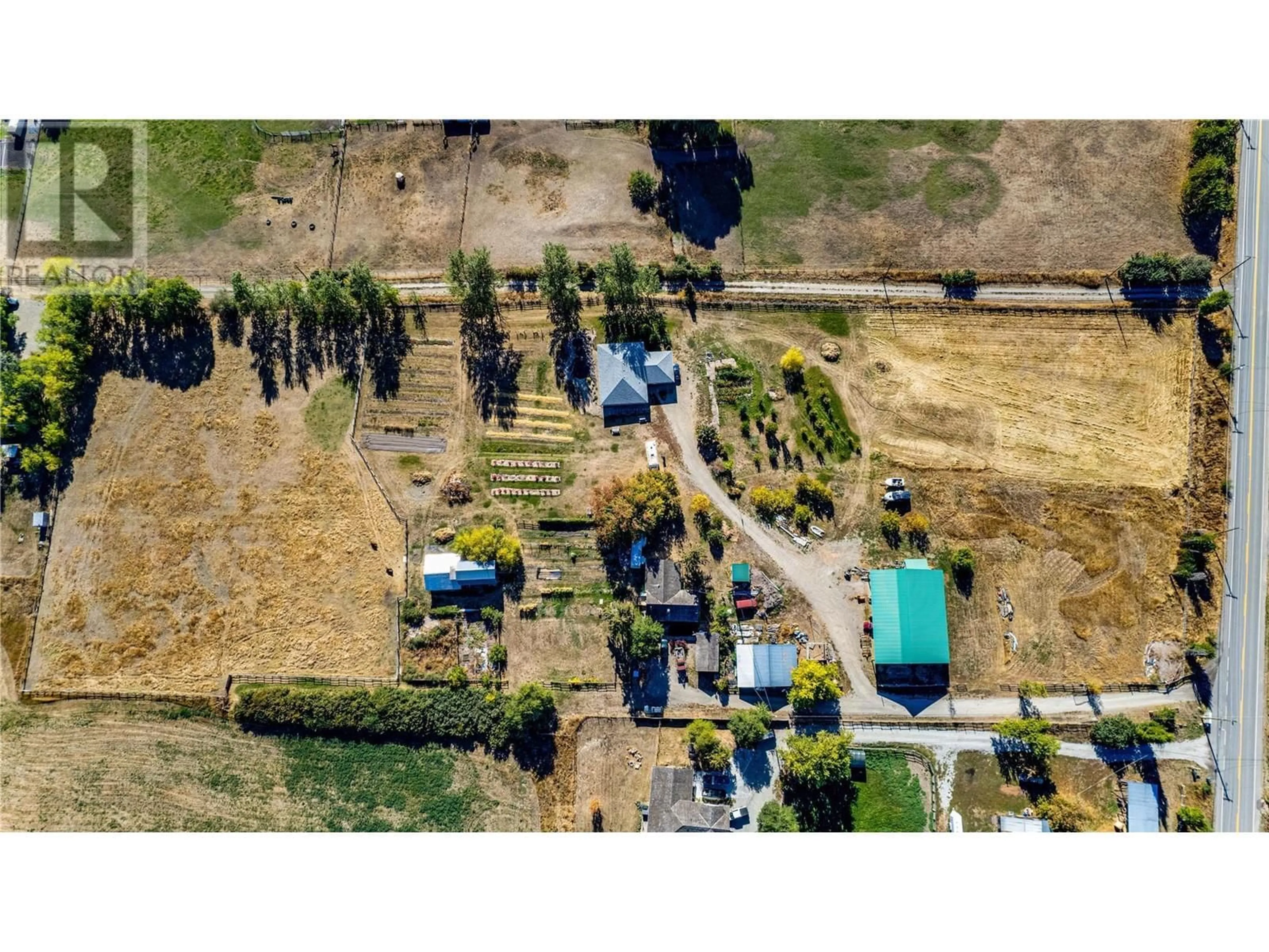 A pic from outside/outdoor area/front of a property/back of a property/a pic from drone, unknown for 7937 OLD KAMLOOPS ROAD, Vernon British Columbia V1H1W8