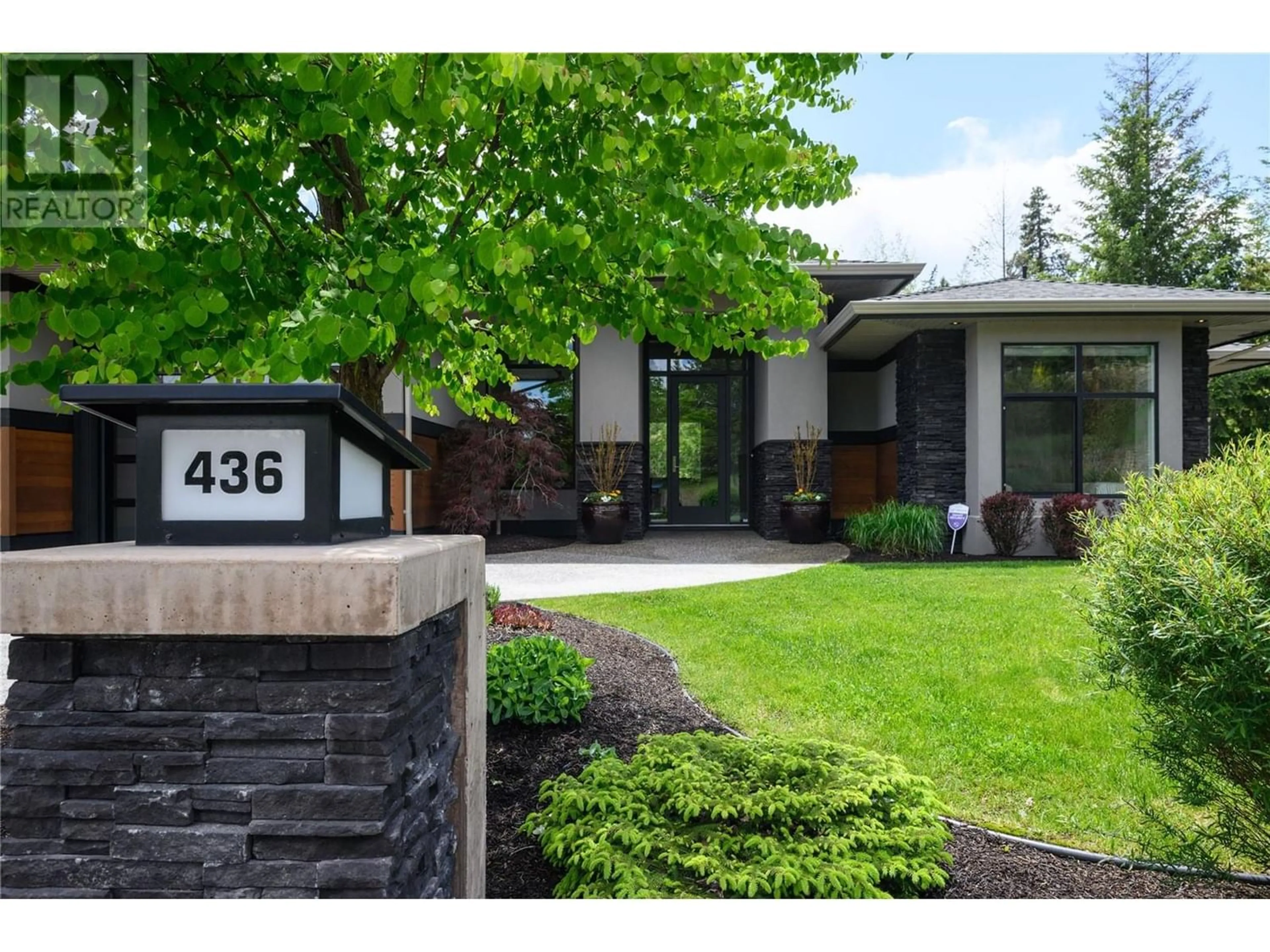 Frontside or backside of a home for 436 Predator Ridge Drive, Vernon British Columbia V1H2L7