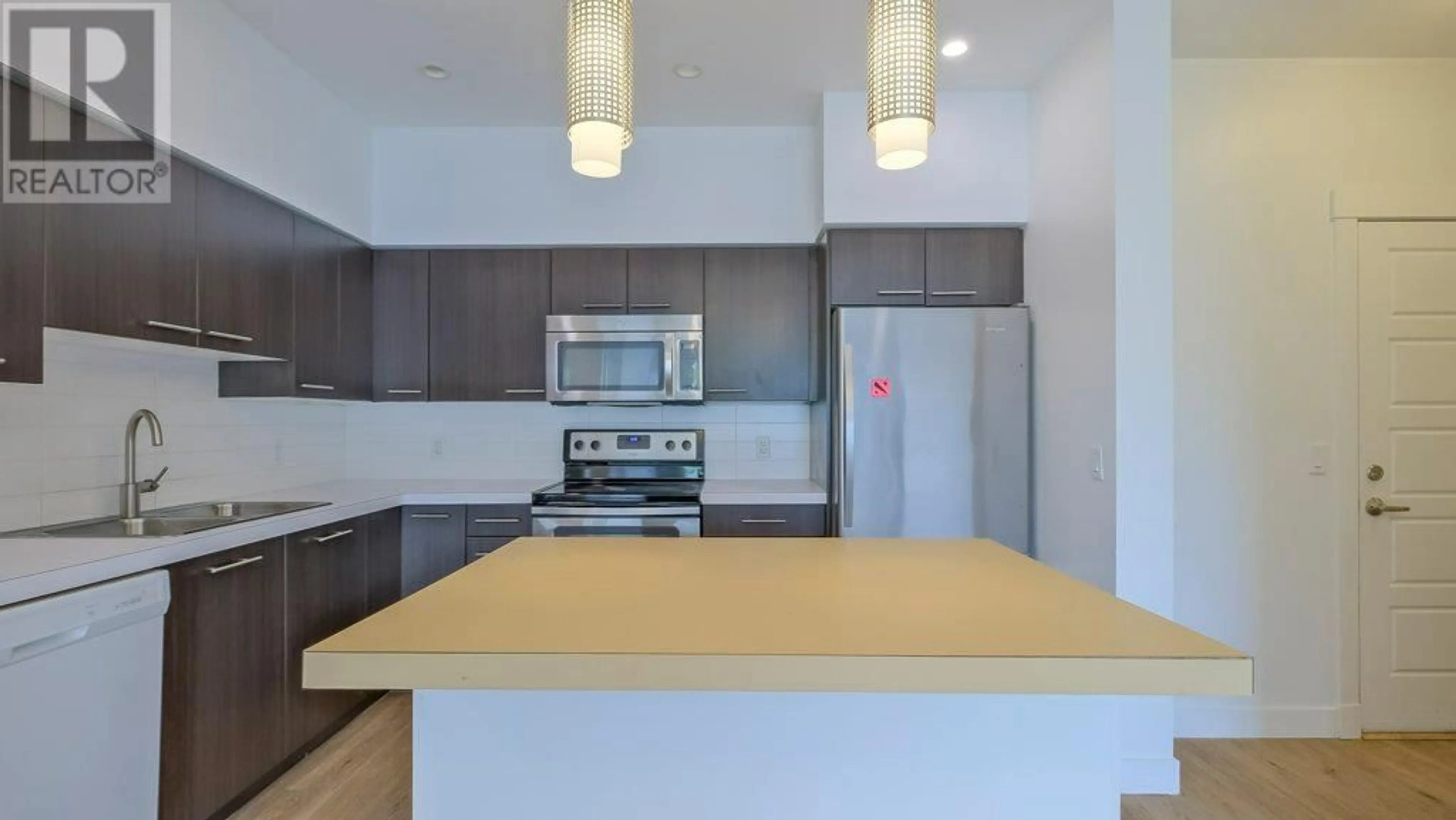 Standard kitchen, unknown for 101 - 985 ACADEMY WAY, Kelowna British Columbia V1V3C8