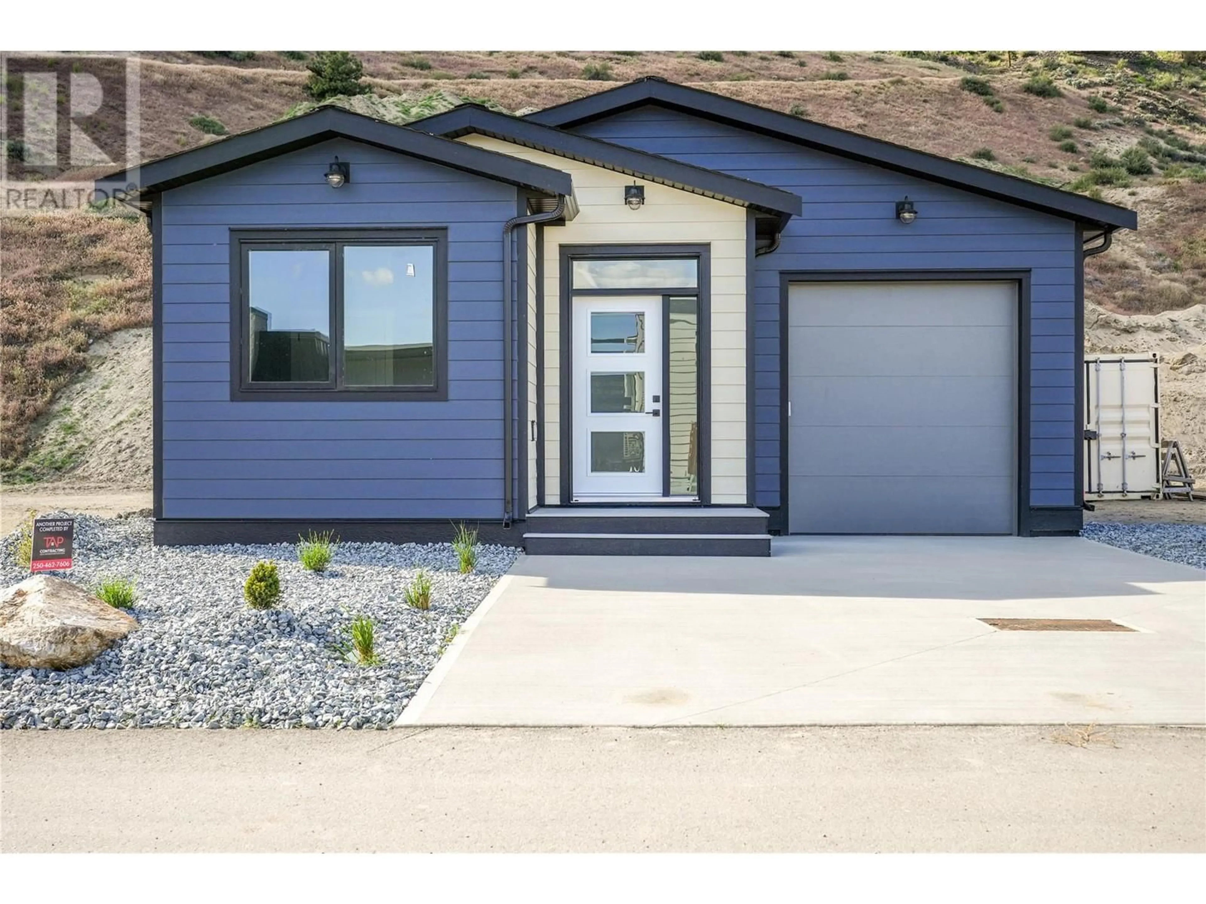 Home with vinyl exterior material, street for 1250 COPPER ROAD, Oliver British Columbia V0H1T5