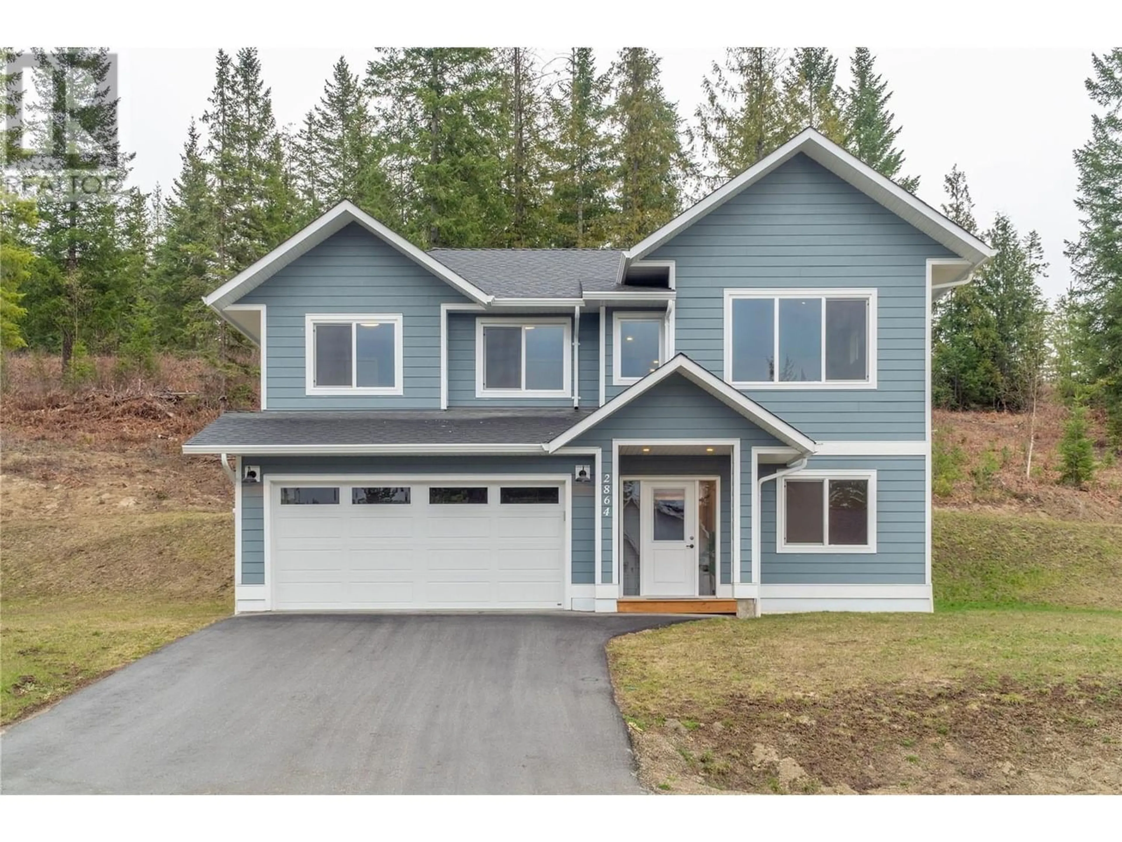 Contemporary kitchen, wood floors for 2864 Golf Course Drive, Blind Bay British Columbia V0E1H2