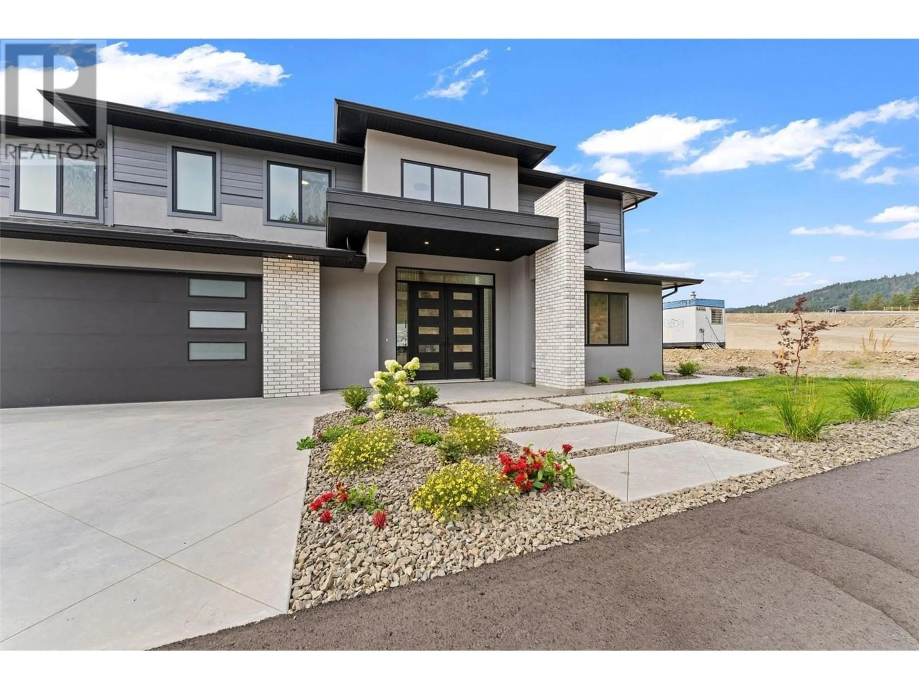 Home with brick exterior material for 2871 Copper Ridge Drive, West Kelowna British Columbia V4T0E7