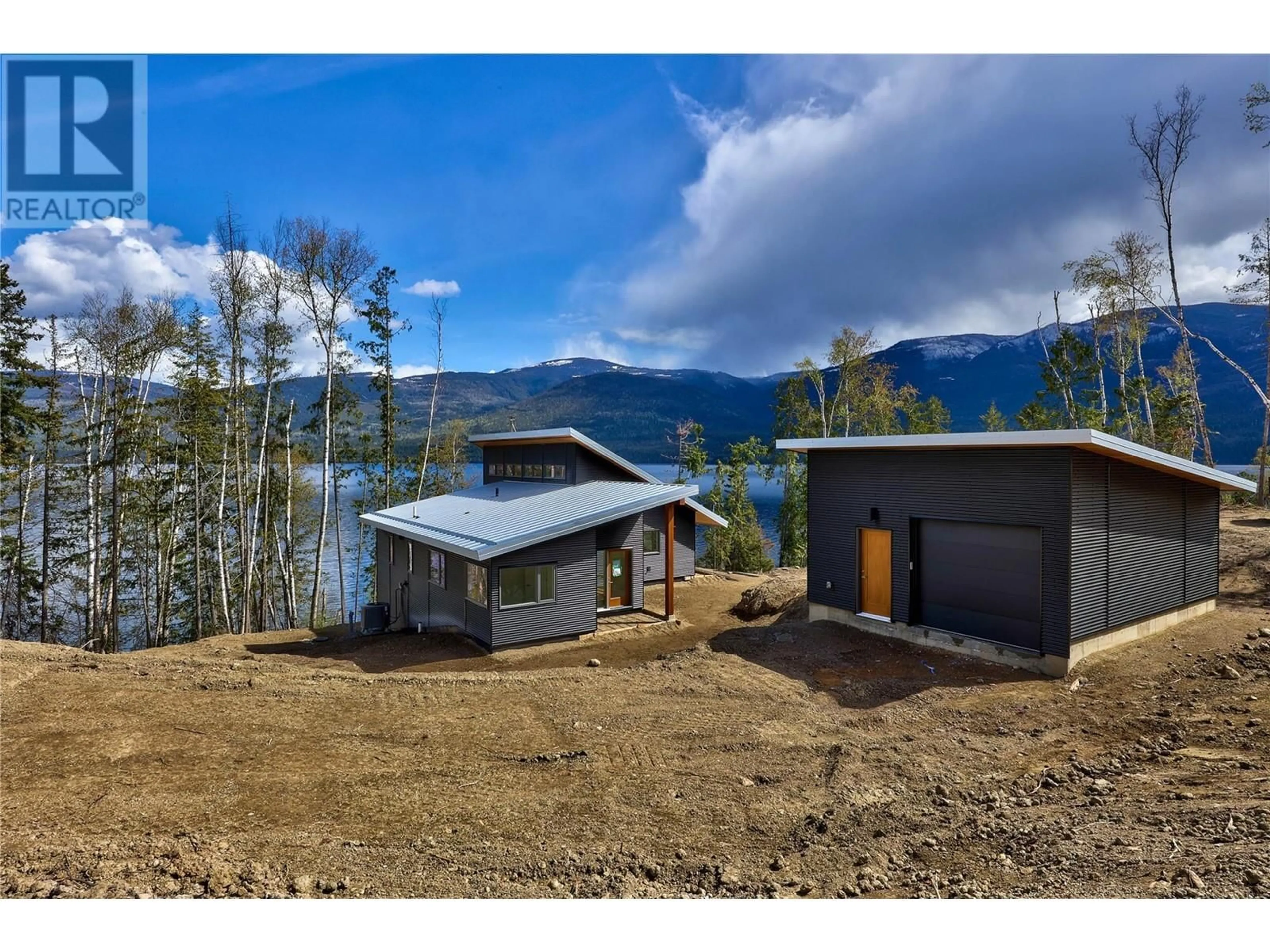 A pic from outside/outdoor area/front of a property/back of a property/a pic from drone, water/lake/river/ocean view for 5600 Adams West FSR Lot# Lot 1, Adams Lake British Columbia V2E1L3