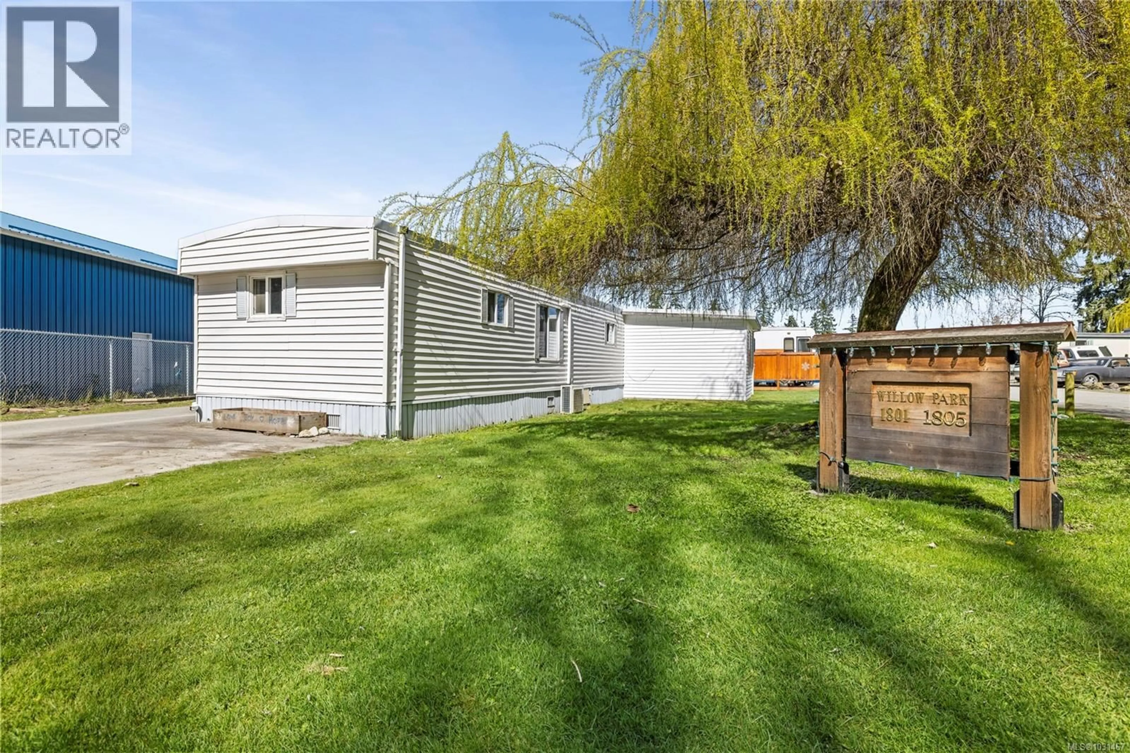 A pic from outside/outdoor area/front of a property/back of a property/a pic from drone, street for 14 - 1801 SCHAFERS STREET, Coombs British Columbia V0R1M0