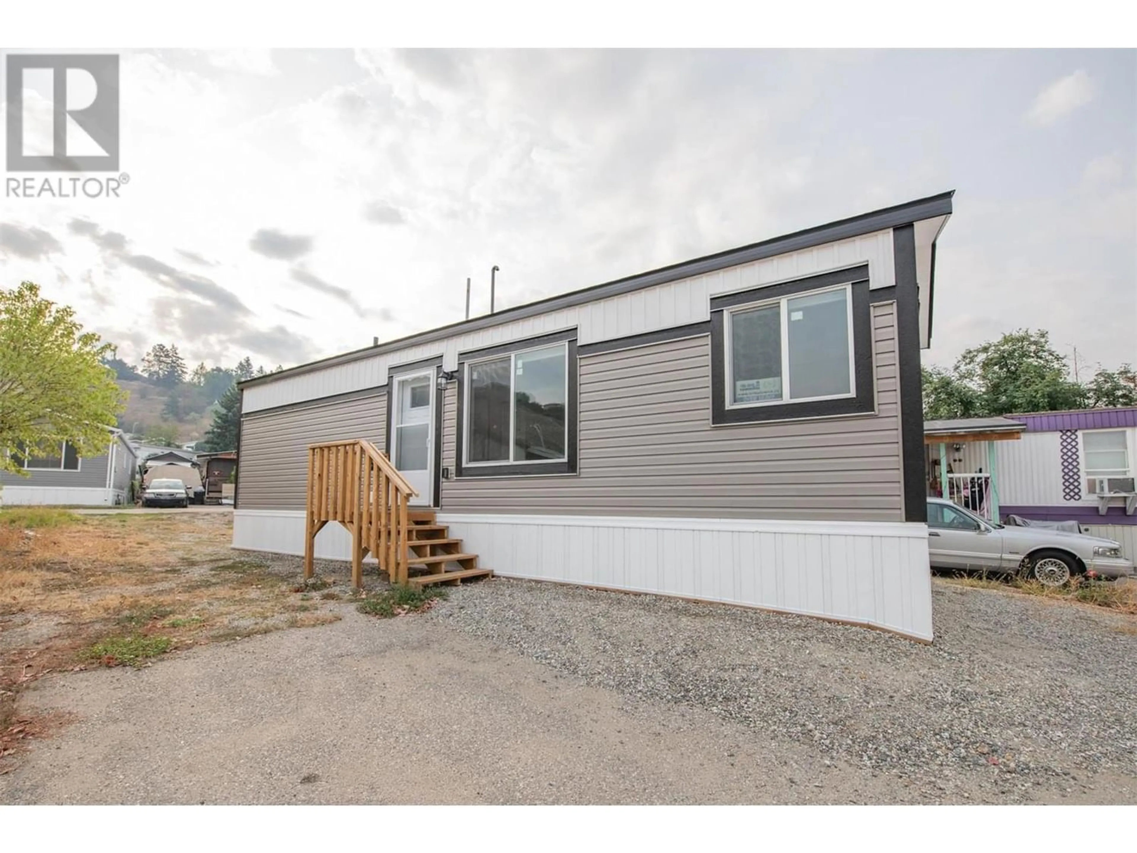 Home with vinyl exterior material for 15401 Kalamalka Road Unit# 151, Vernon British Columbia V1B2B3