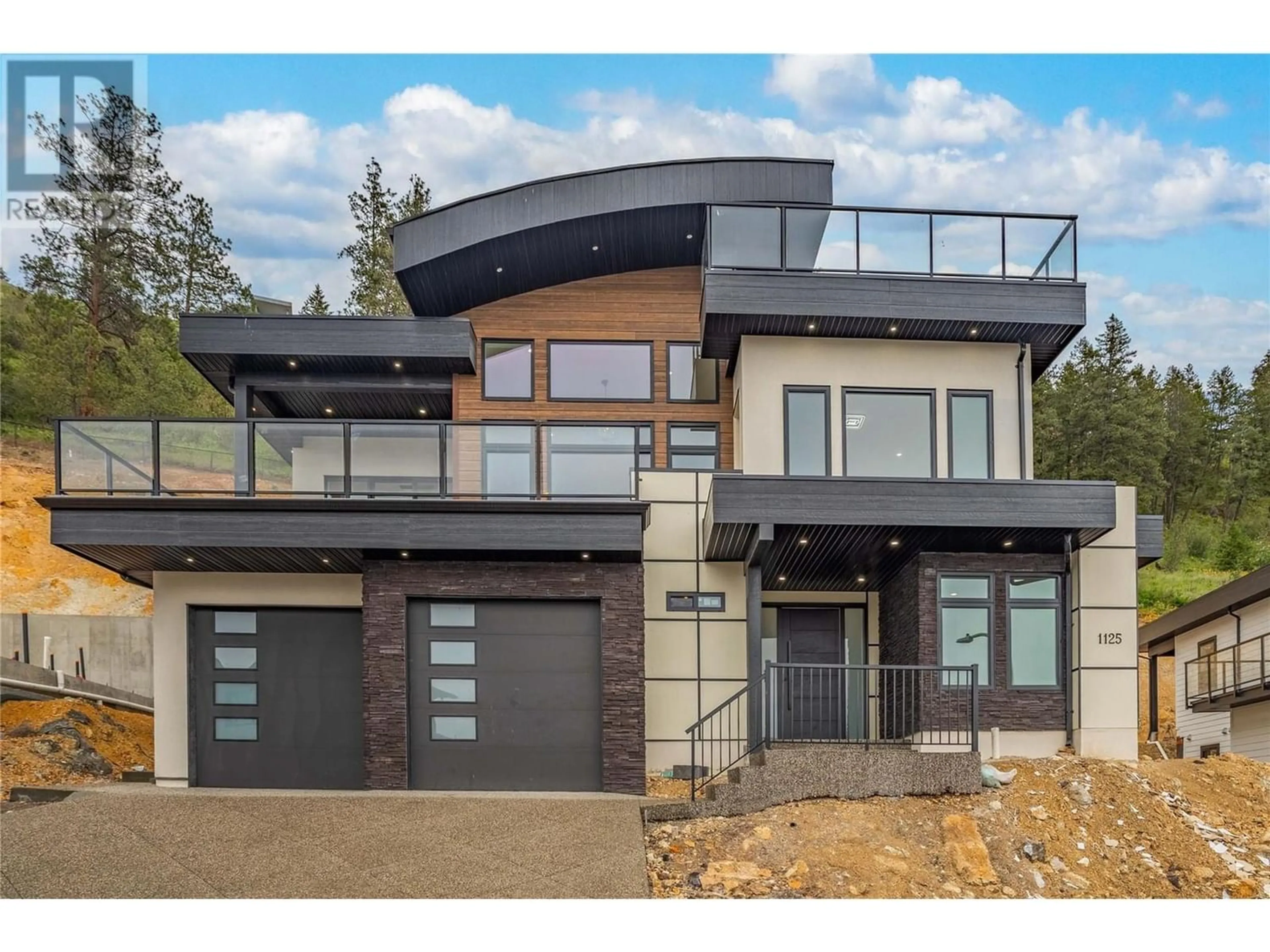 Frontside or backside of a home for 1125 Lone Pine Drive, Kelowna British Columbia V1P0A5