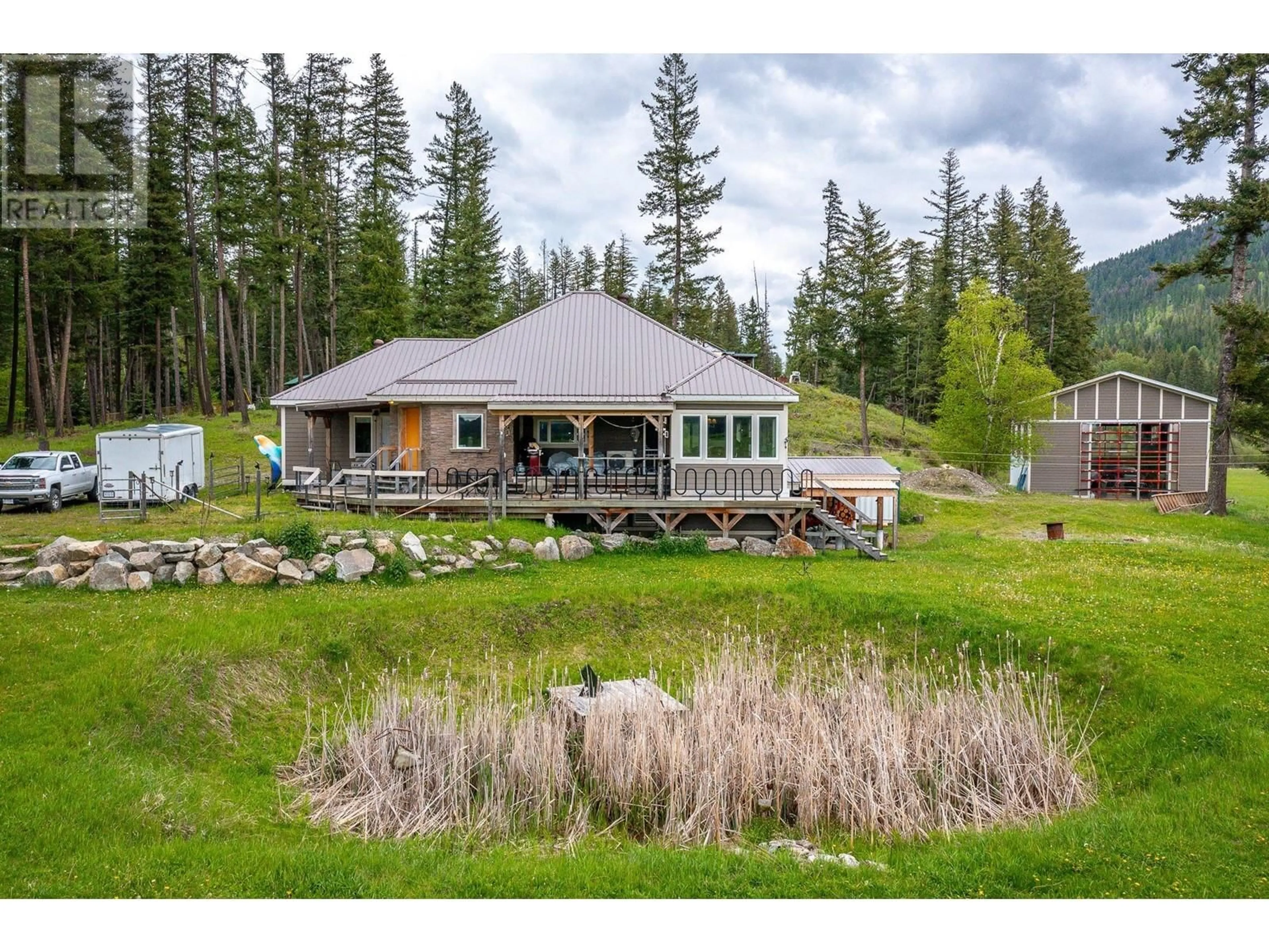 A pic from outside/outdoor area/front of a property/back of a property/a pic from drone, unknown for 4 Hollingsworth Road, Cherryville British Columbia V0E2G3