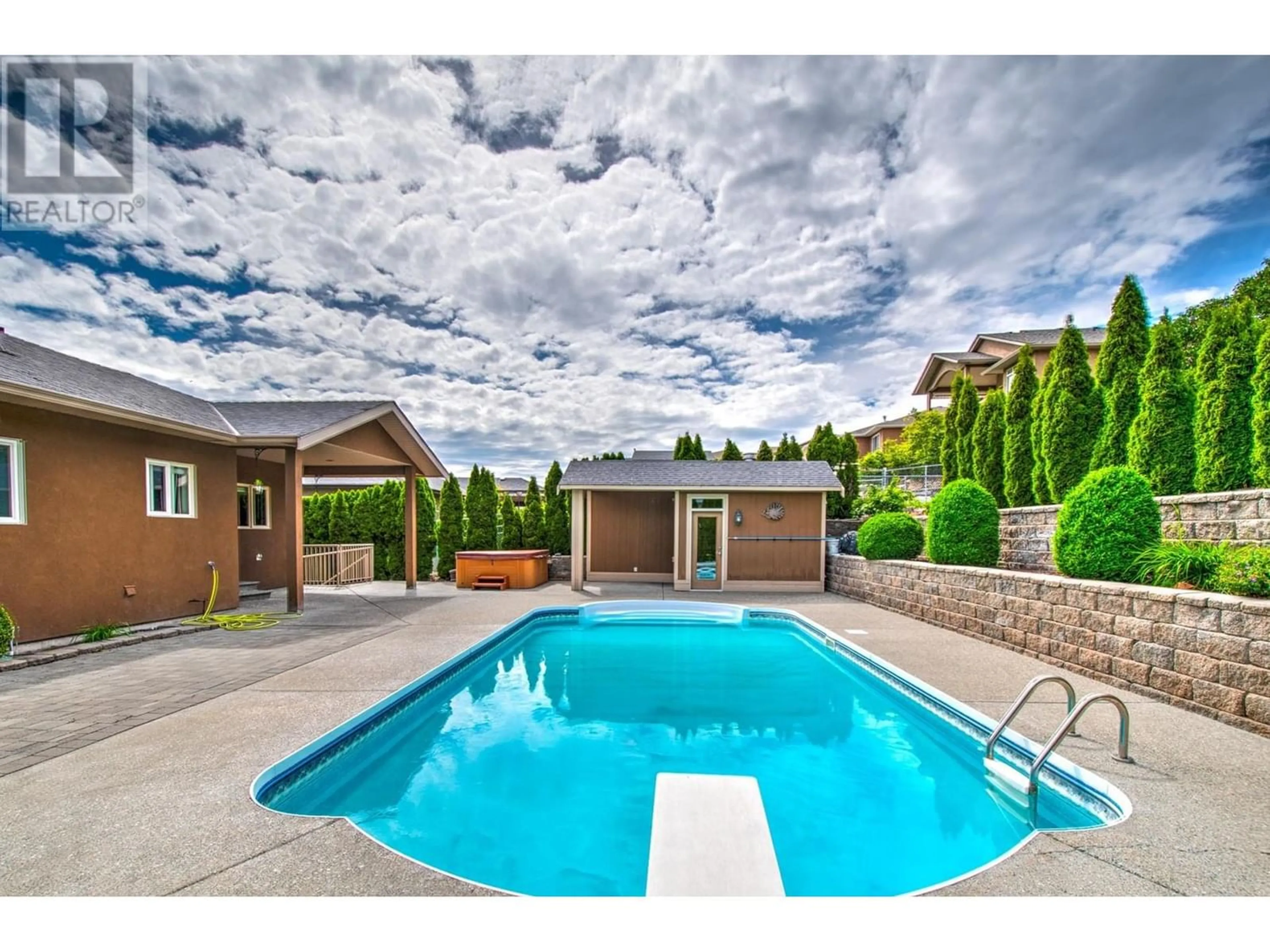 Frontside or backside of a home for 7112 Jasper Drive, Vernon British Columbia V1H2J3