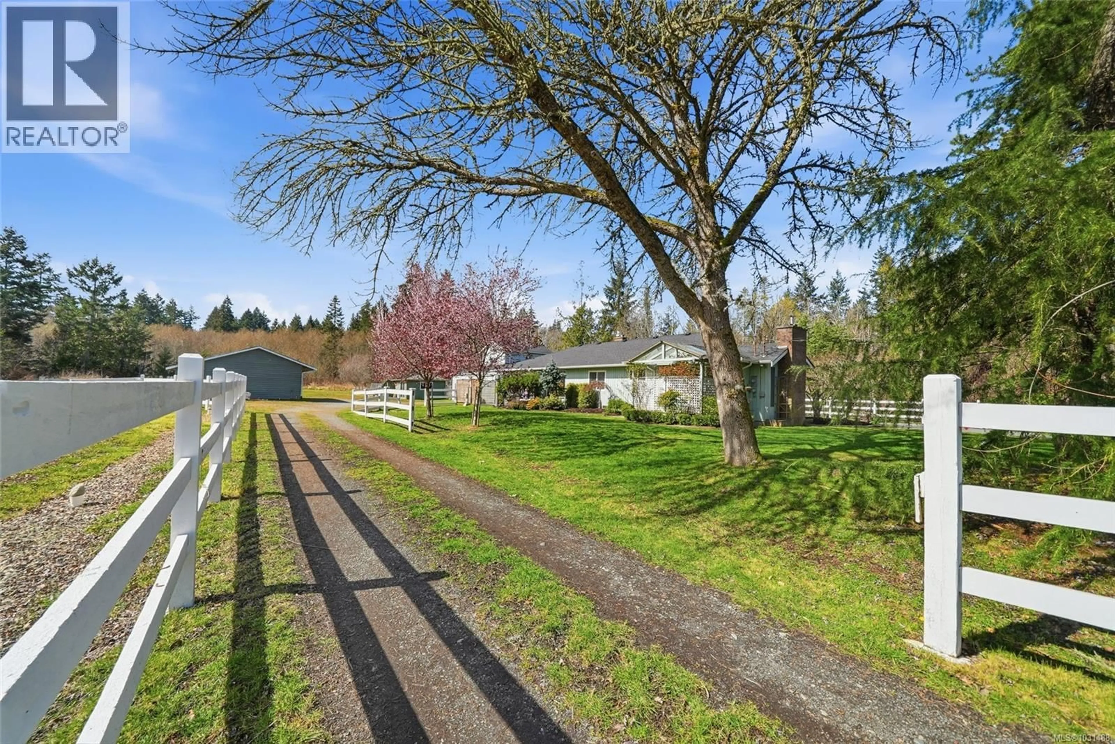 A pic from outside/outdoor area/front of a property/back of a property/a pic from drone, street for 792 BENNETT ROAD, Qualicum Beach British Columbia V9K1N1