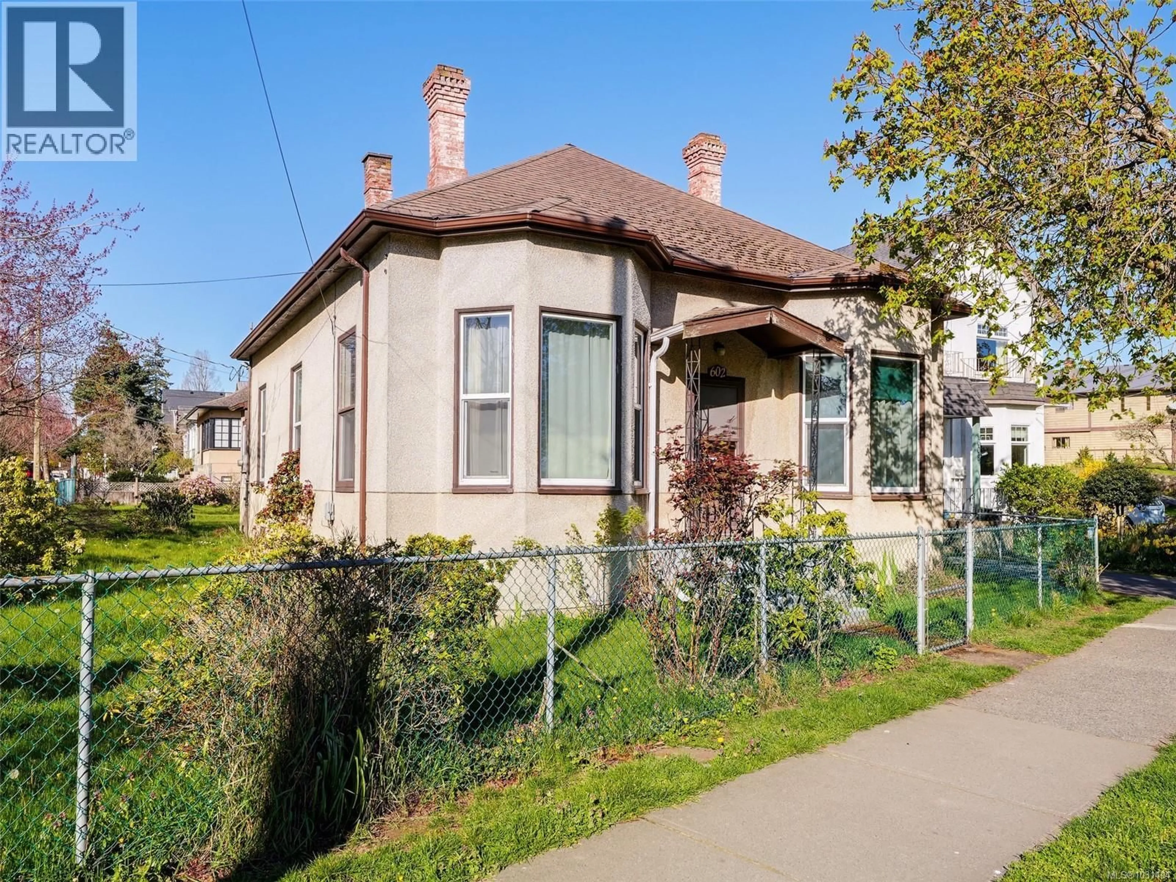 Home with brick exterior material, street for 602 CRAIGFLOWER ROAD, Victoria British Columbia V9A2W2