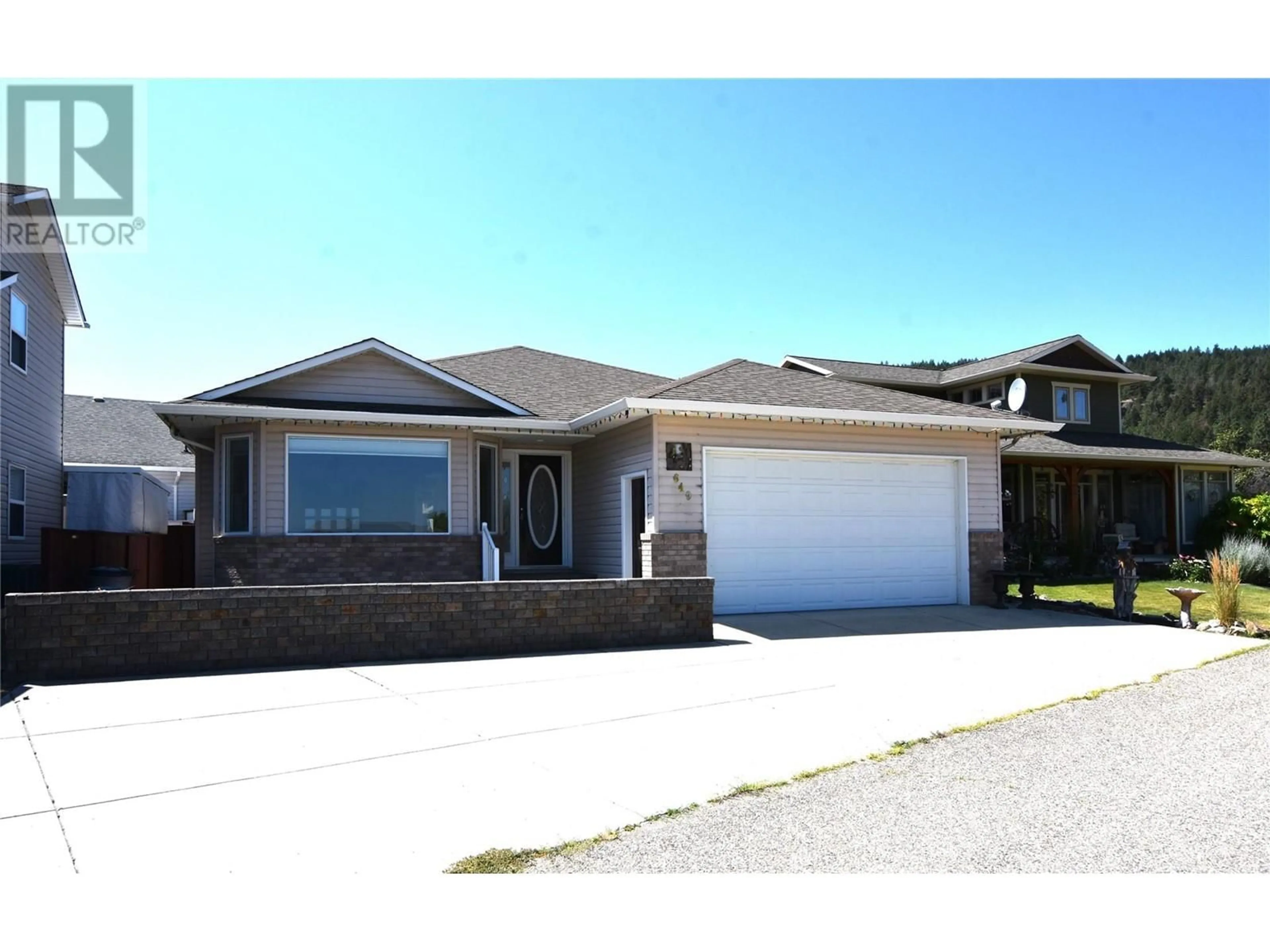 Home with vinyl exterior material, street for 649 ELK STREET, Vernon British Columbia V1H2A1