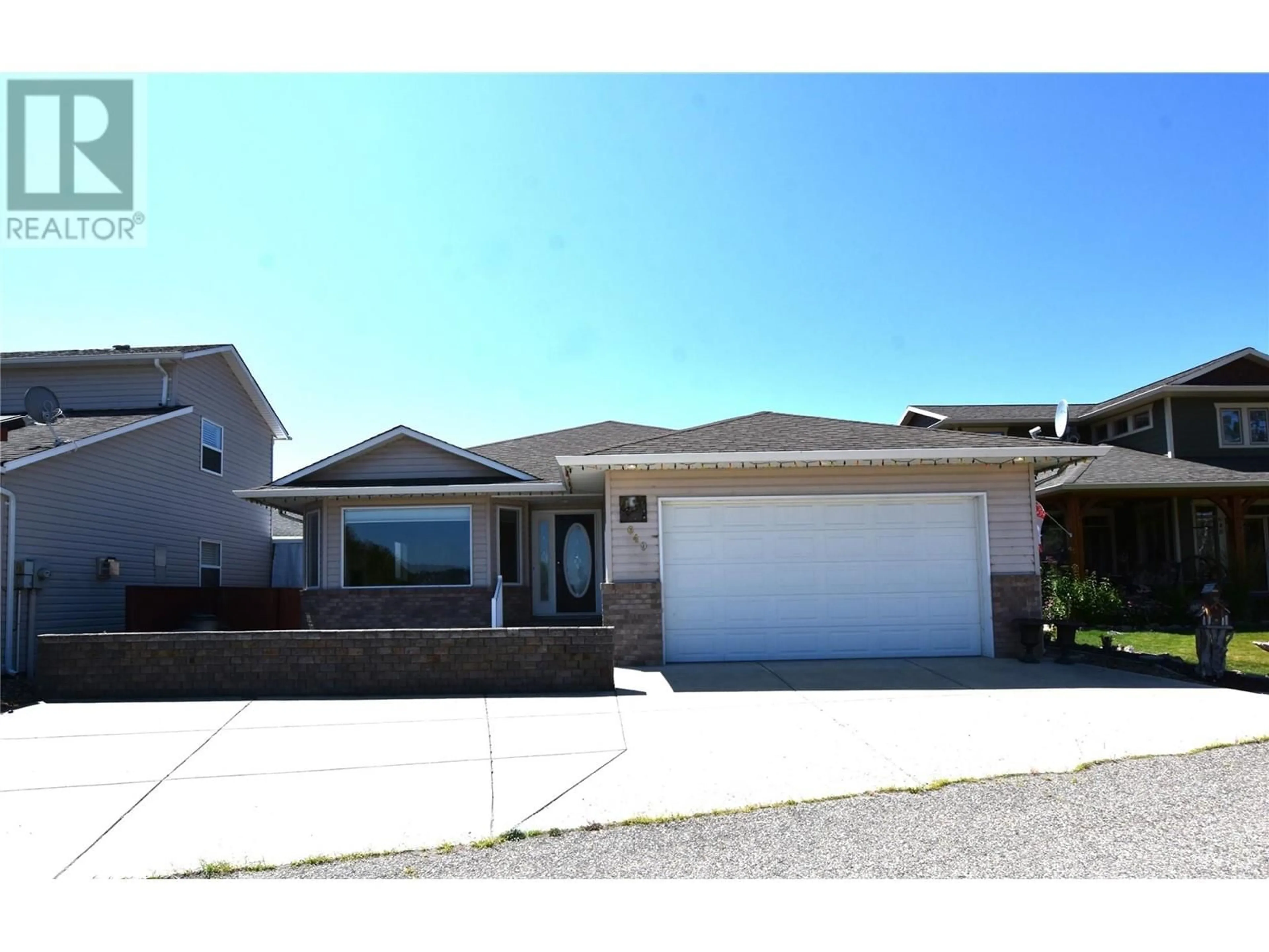 A pic from outside/outdoor area/front of a property/back of a property/a pic from drone, mountain view for 649 ELK STREET, Vernon British Columbia V1H2A1