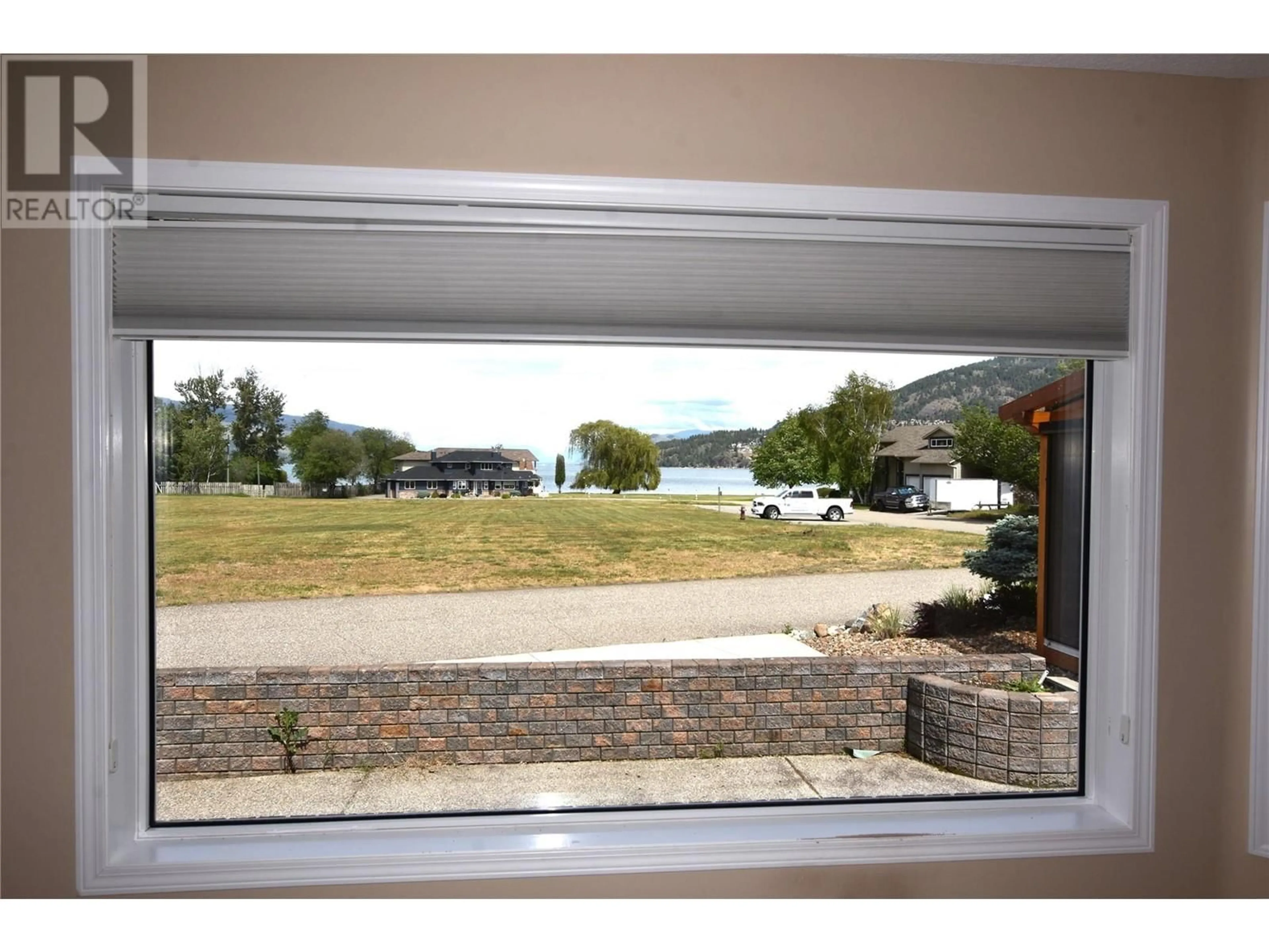 A pic from outside/outdoor area/front of a property/back of a property/a pic from drone, water/lake/river/ocean view for 649 ELK STREET, Vernon British Columbia V1H2A1