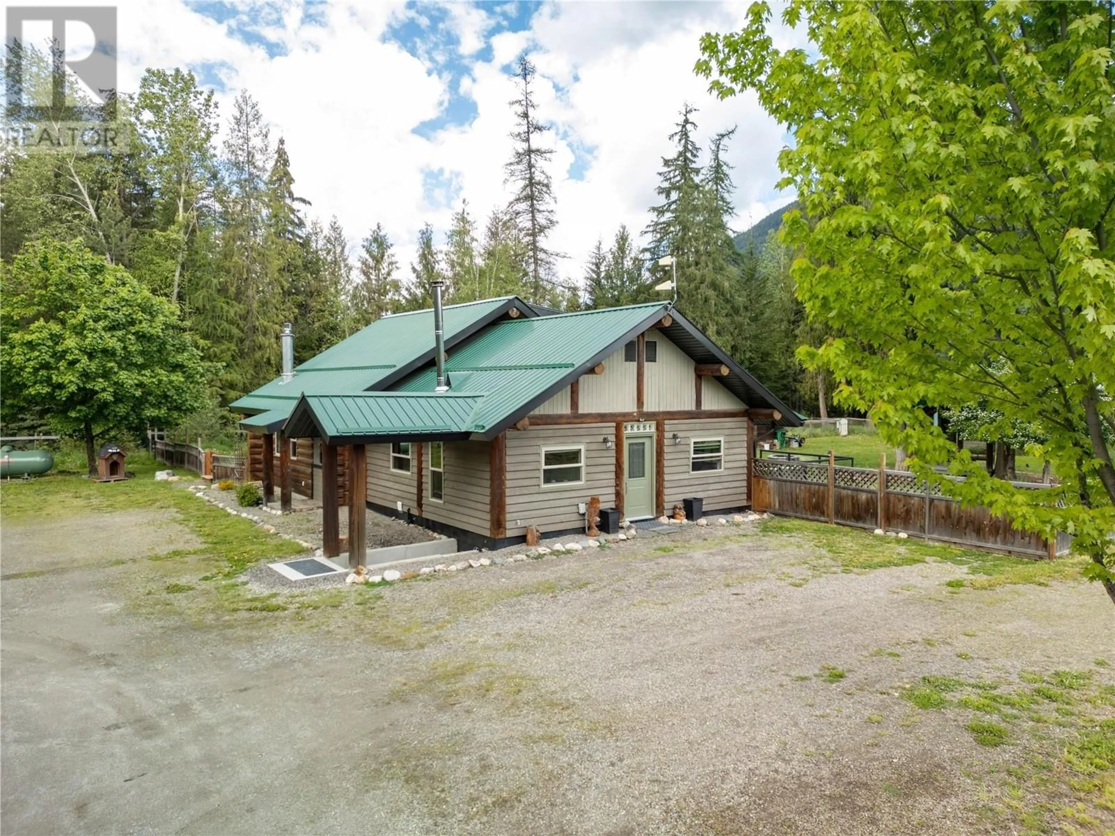 A pic from outside/outdoor area/front of a property/back of a property/a pic from drone, unknown for 28 BEGBIE ROAD, Cherryville British Columbia V0E2G3