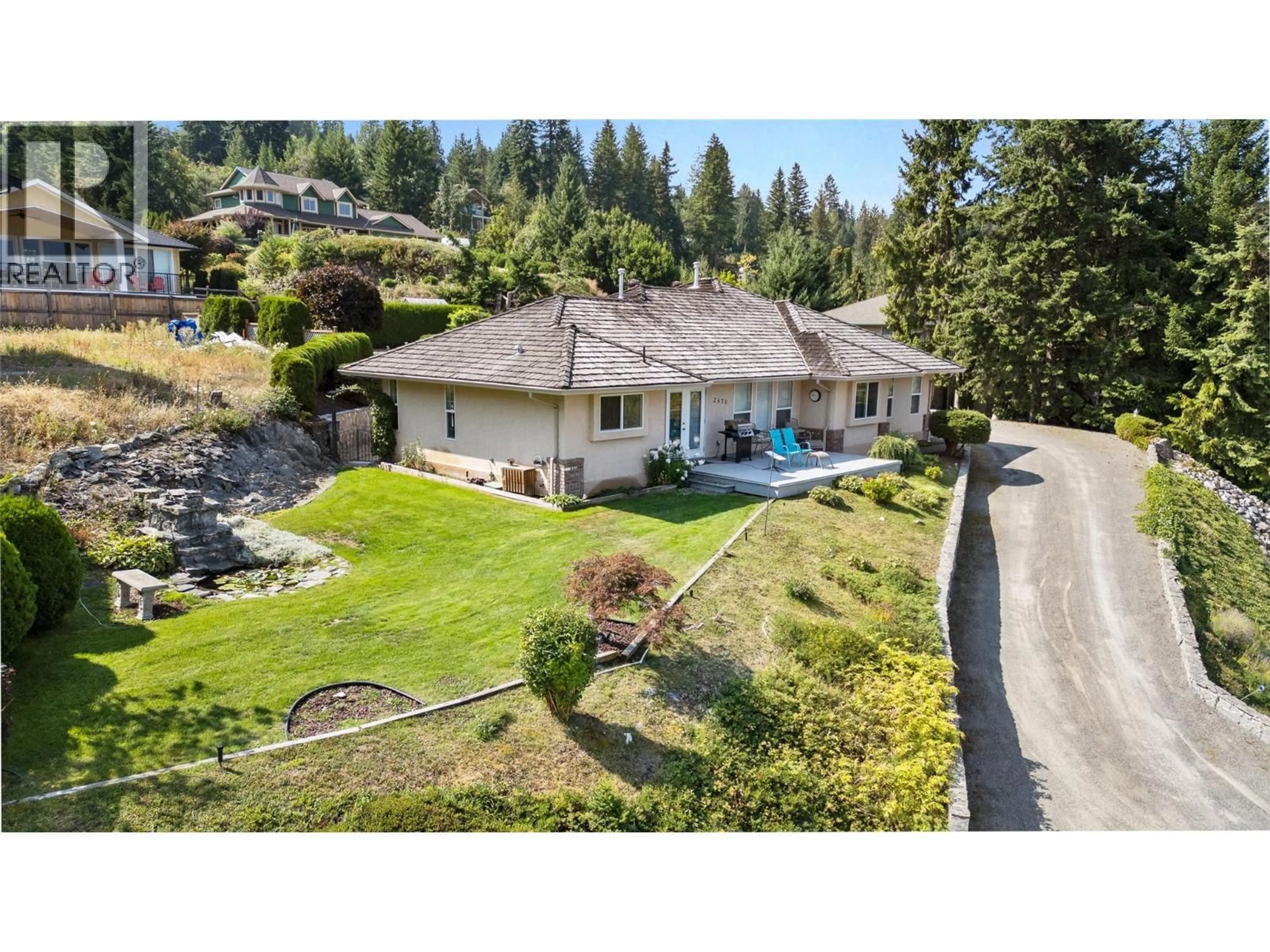 A pic from outside/outdoor area/front of a property/back of a property/a pic from drone, water/lake/river/ocean view for 2670 DOEBERT ROAD, Blind Bay British Columbia V0E1H1