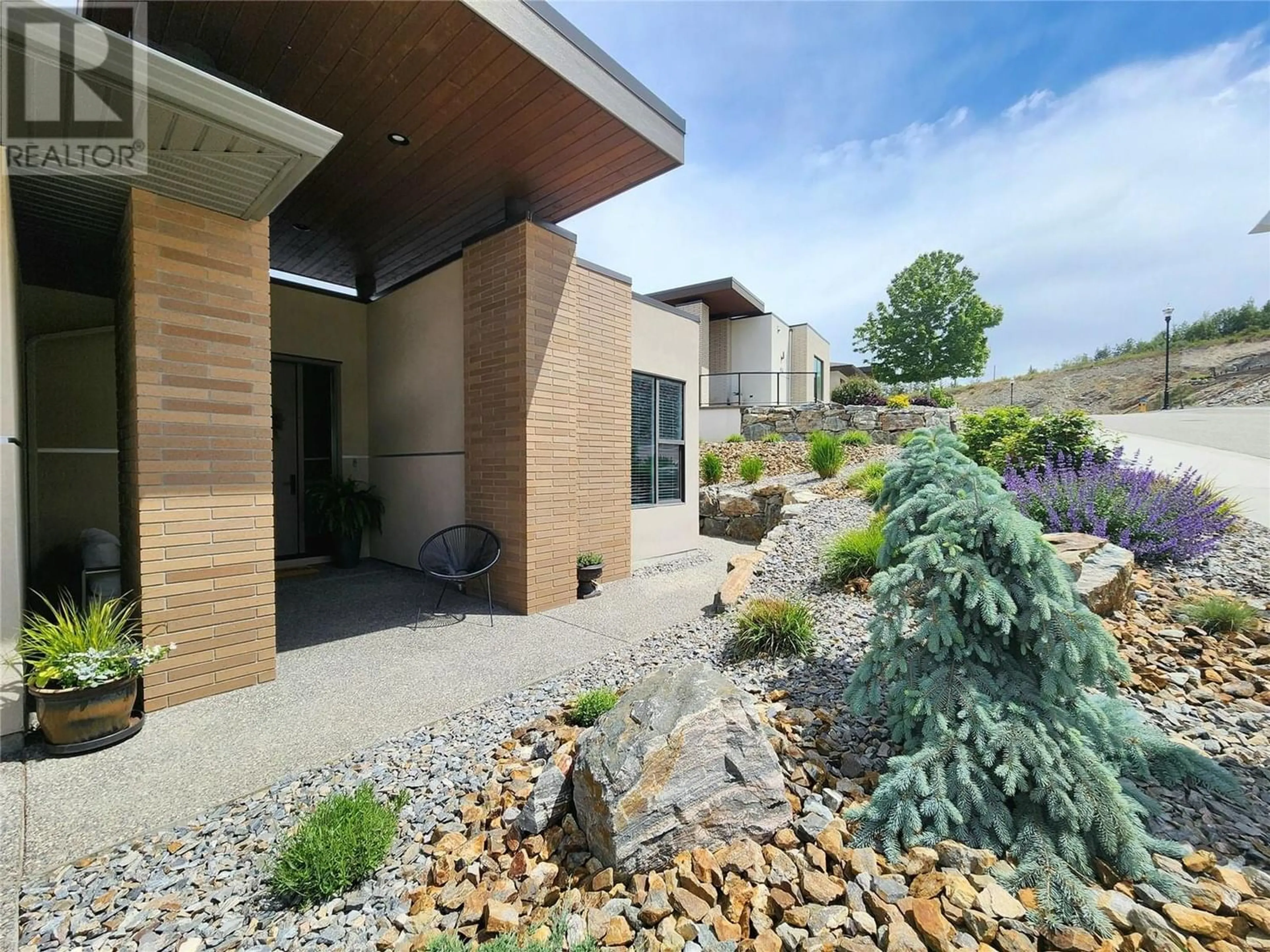 A pic from exterior of the house or condo for 472 Sparrow Hawk Court, Kelowna British Columbia V1W0A6